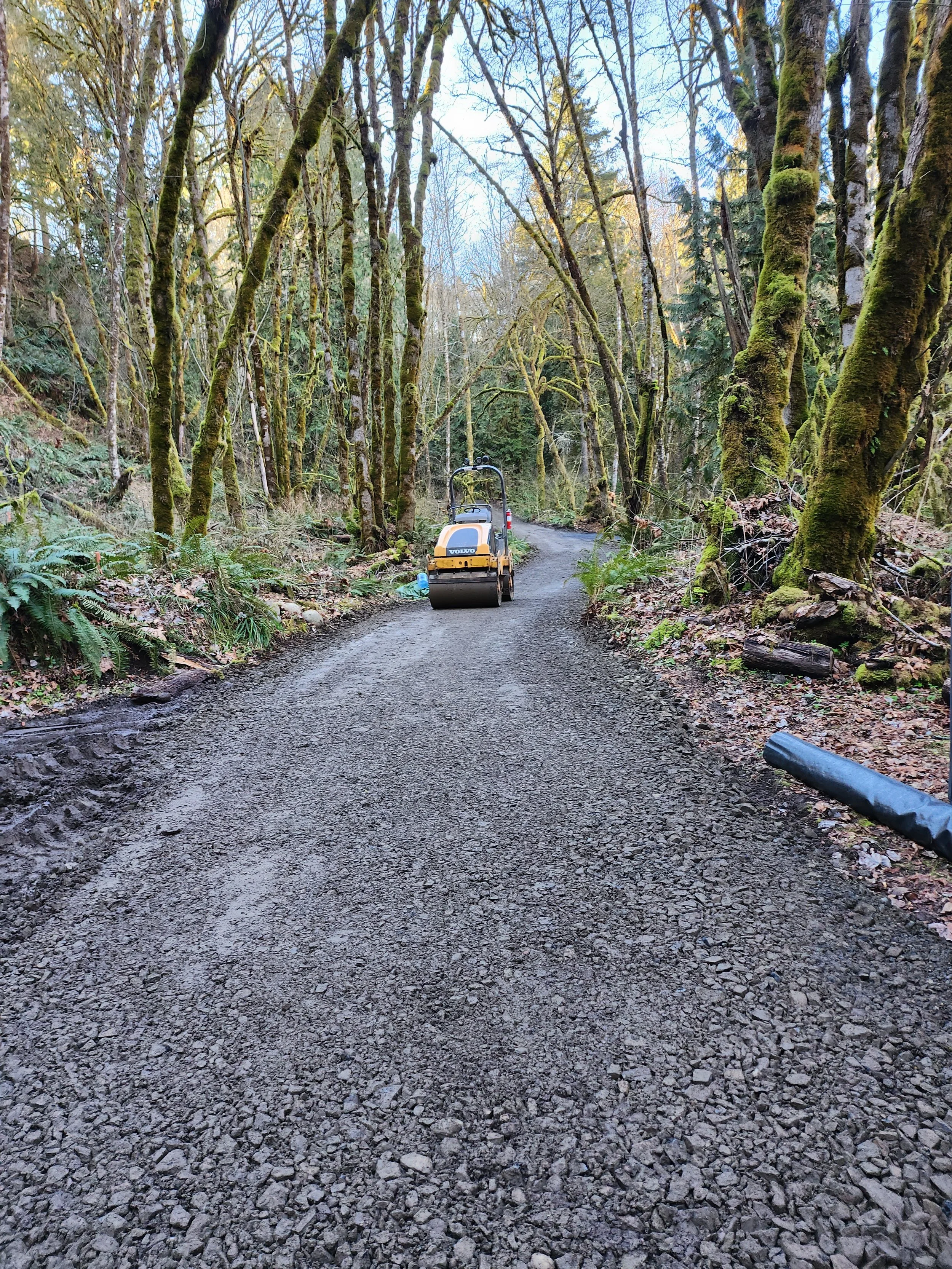 Compaction being performed on winter road installation Toledo, WA