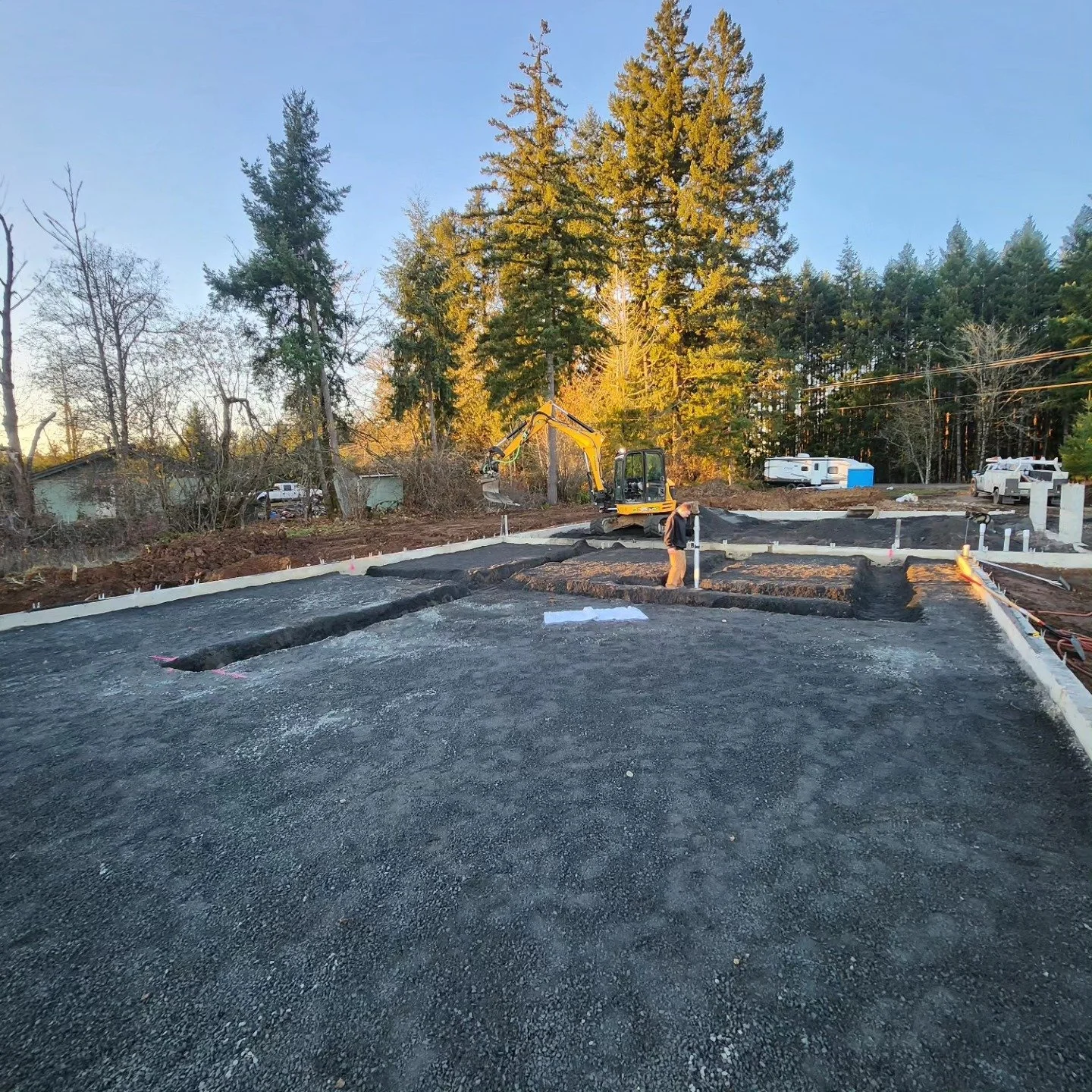 Digging footing with excavator an steelwrist in Winlock, WA