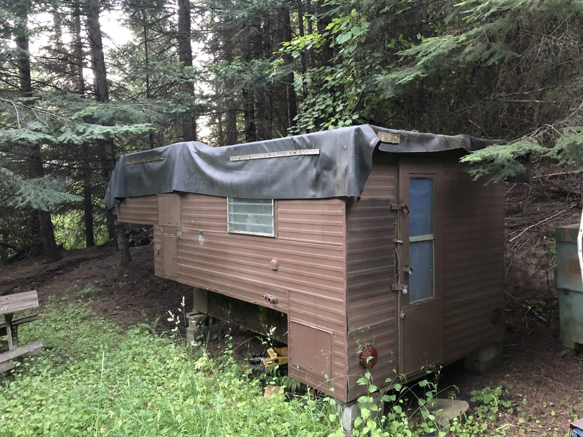Junk camper shell removal.