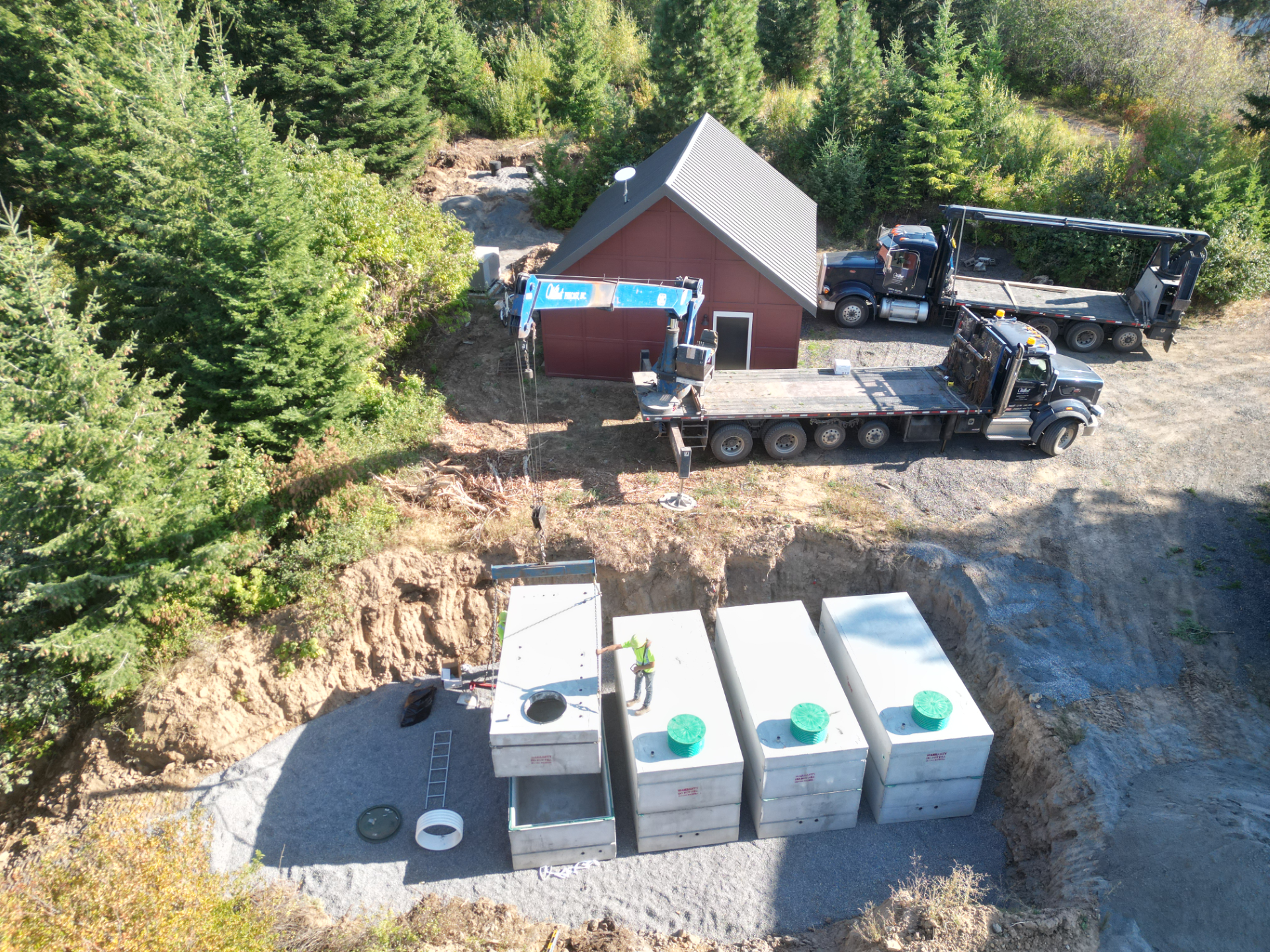 Installation of a 10,000 gallon subterranean wildfire suppression system for a remote off grid homestead.