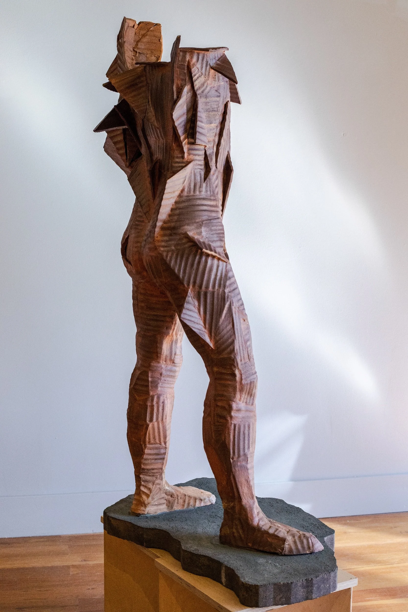 Industrial Man. 43"x 26" x 16", ceramic, paper clay, soda fired.  2021.