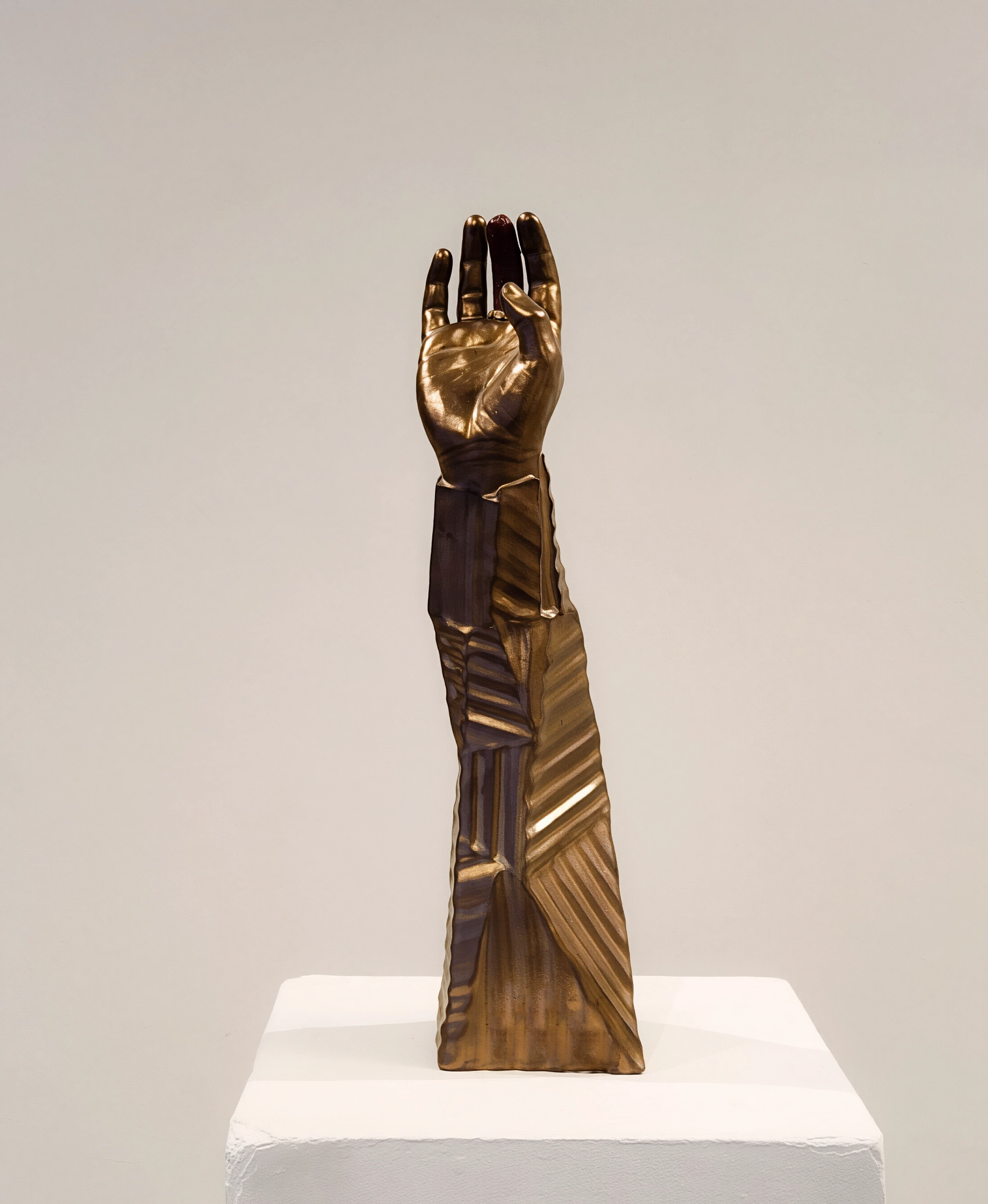 Reliquary- Processed Meat. Ceramic, garnet, hot dog. Cone 6 oxidation. 22" x 6". 2023.