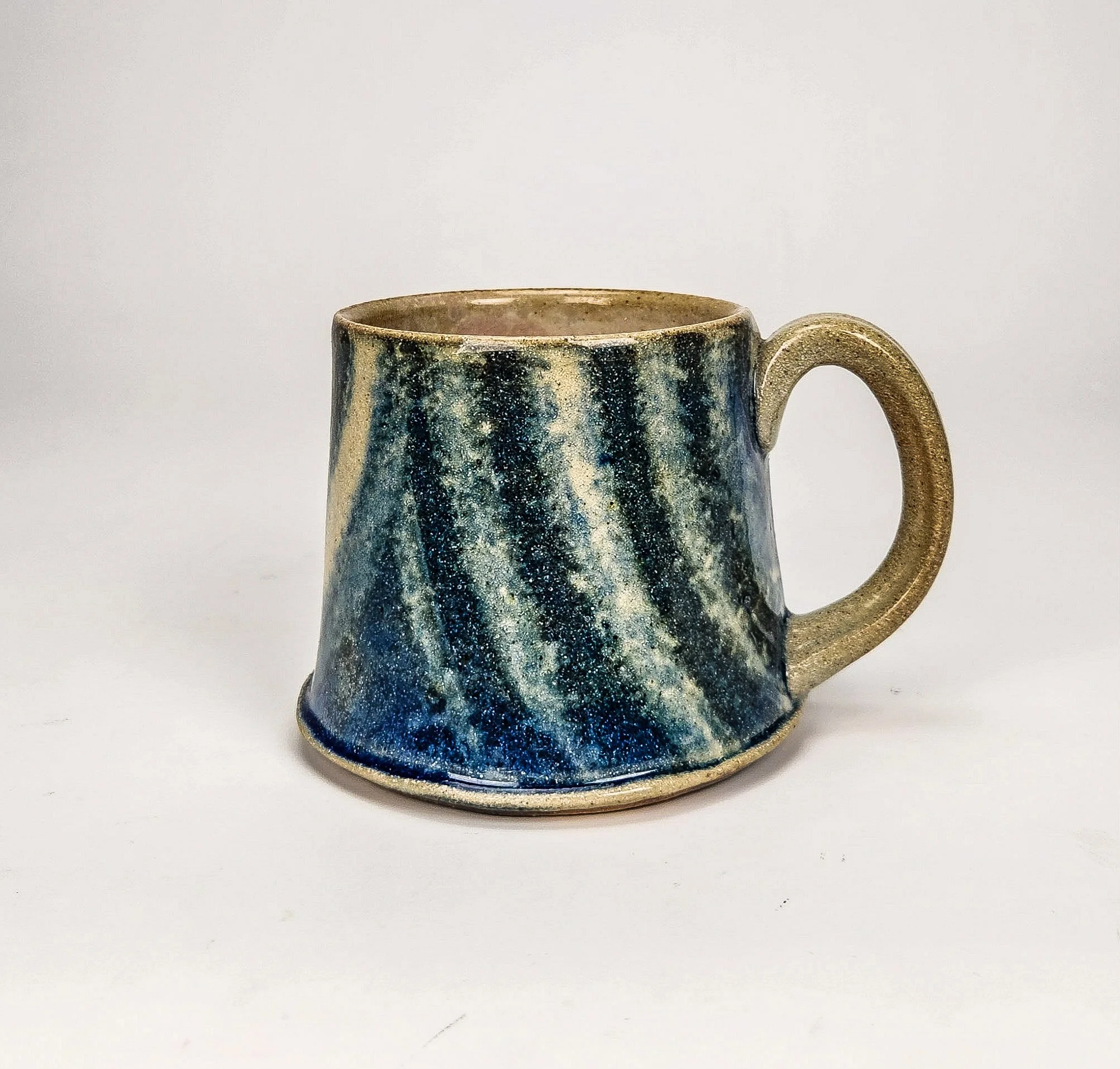 Strata Mug. Colored clay, cone 6 oxidation. 2025.