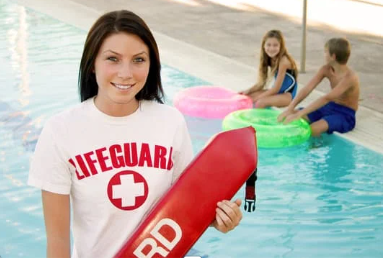 Professional lifeguard on duty at community pool