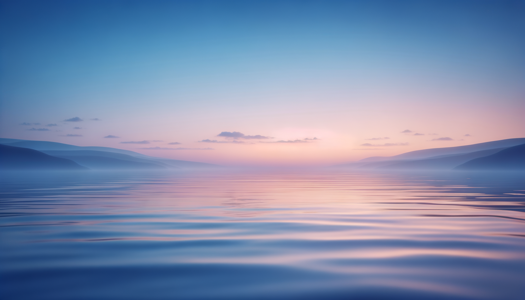 Peaceful lake at dusk with calm water, distant mountains, and a pastel-colored sky.