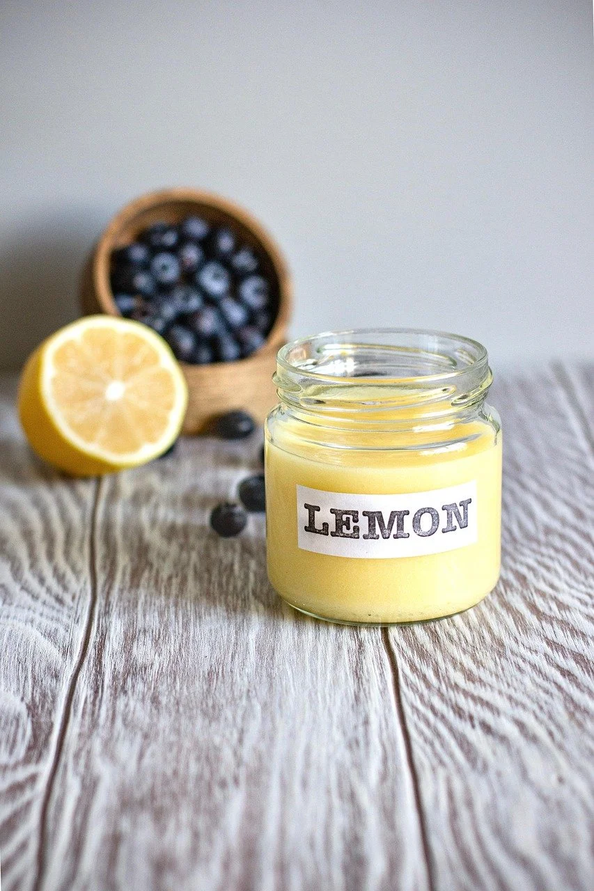 Lemon-scented candle in a glass jar long lasting scented candles for home premium scented candles for relaxation