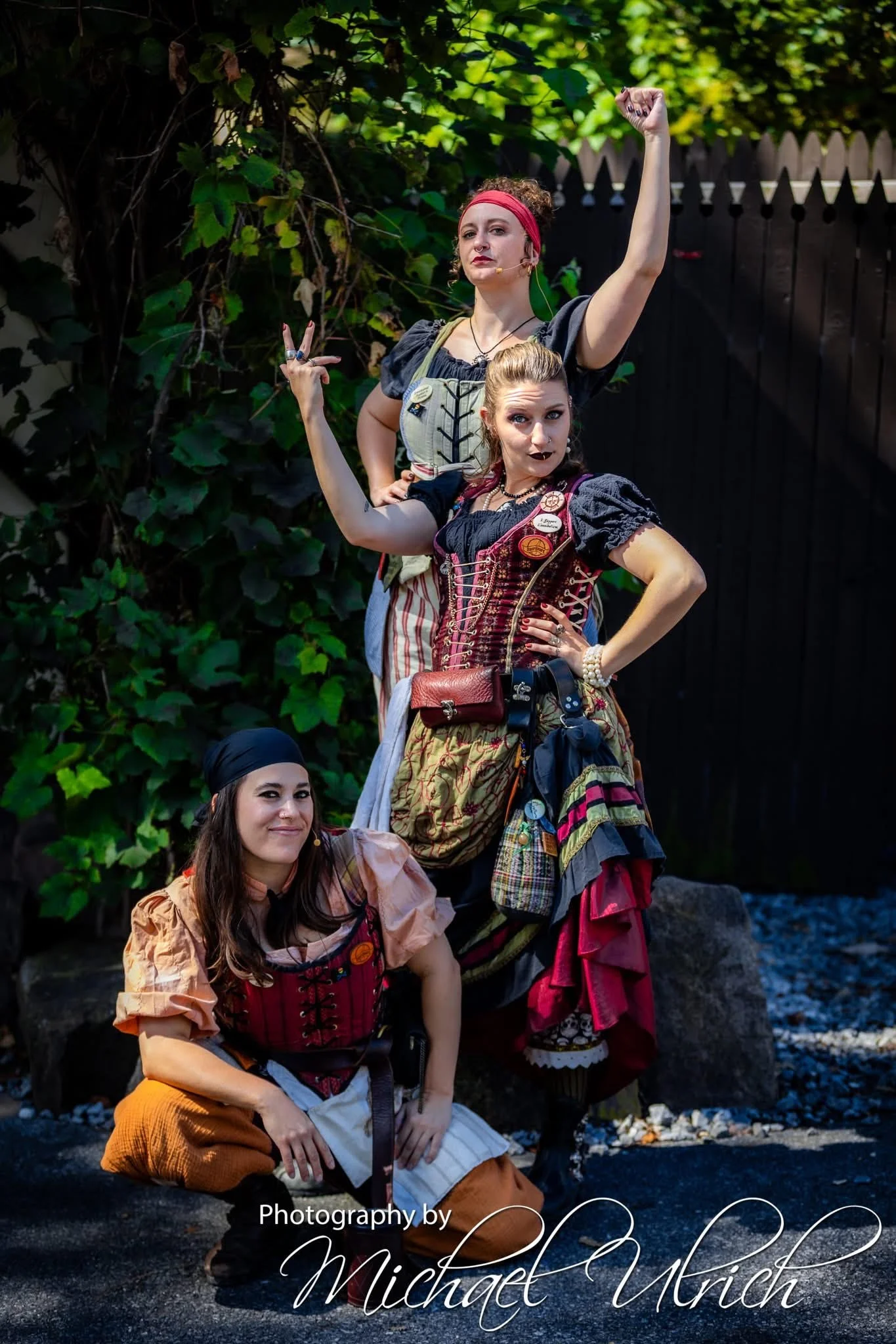 Three women dressed in p
