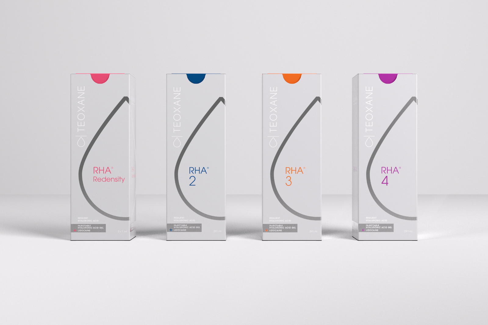 Four boxes of dermal filler products labeled RHA with different numbers and colors based on their type, lined up on a white surface.