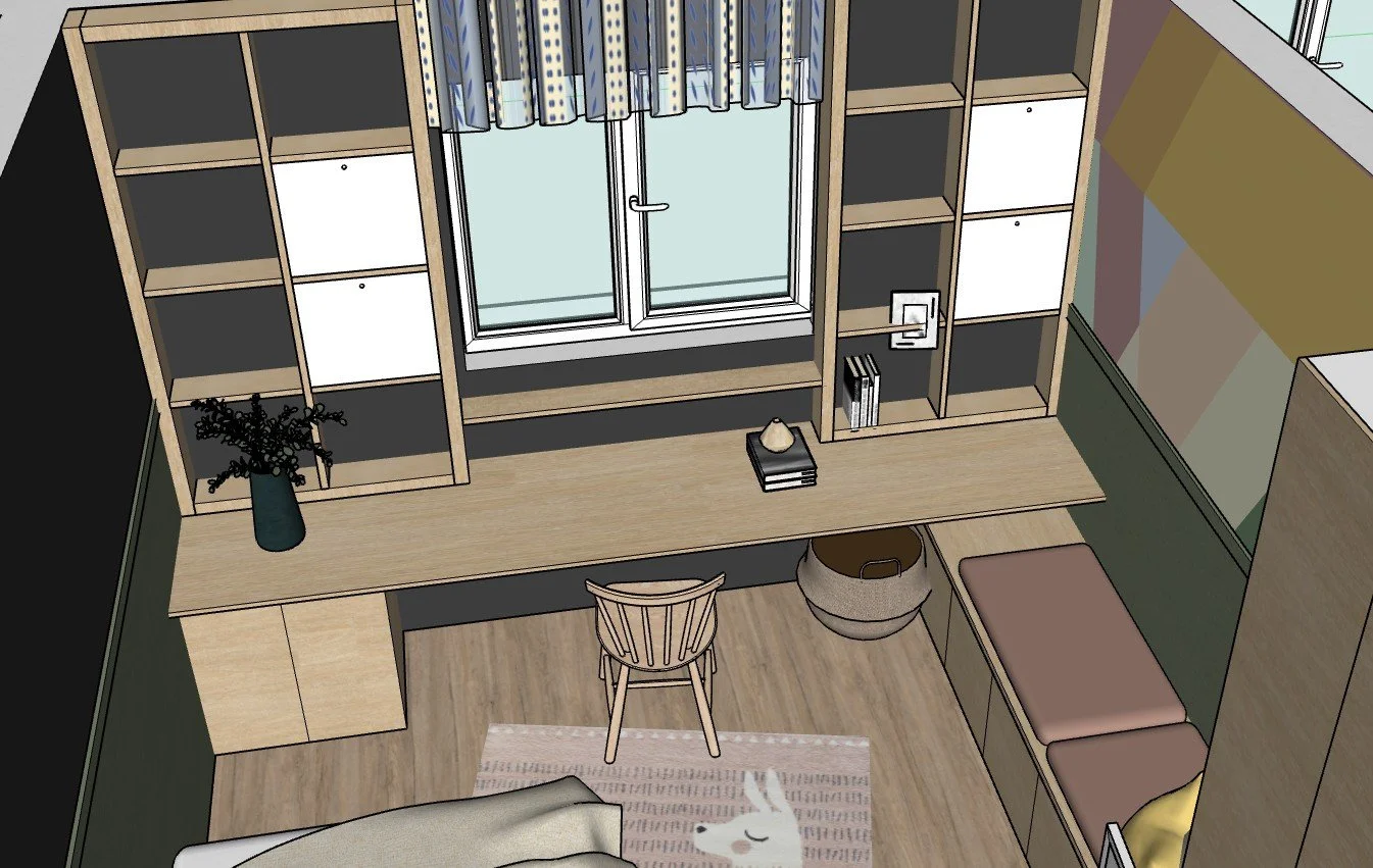 Cozy bedroom corner with built-in desk, open shelving, window with patterned curtains, and small seating area with a bench and pink cushion.