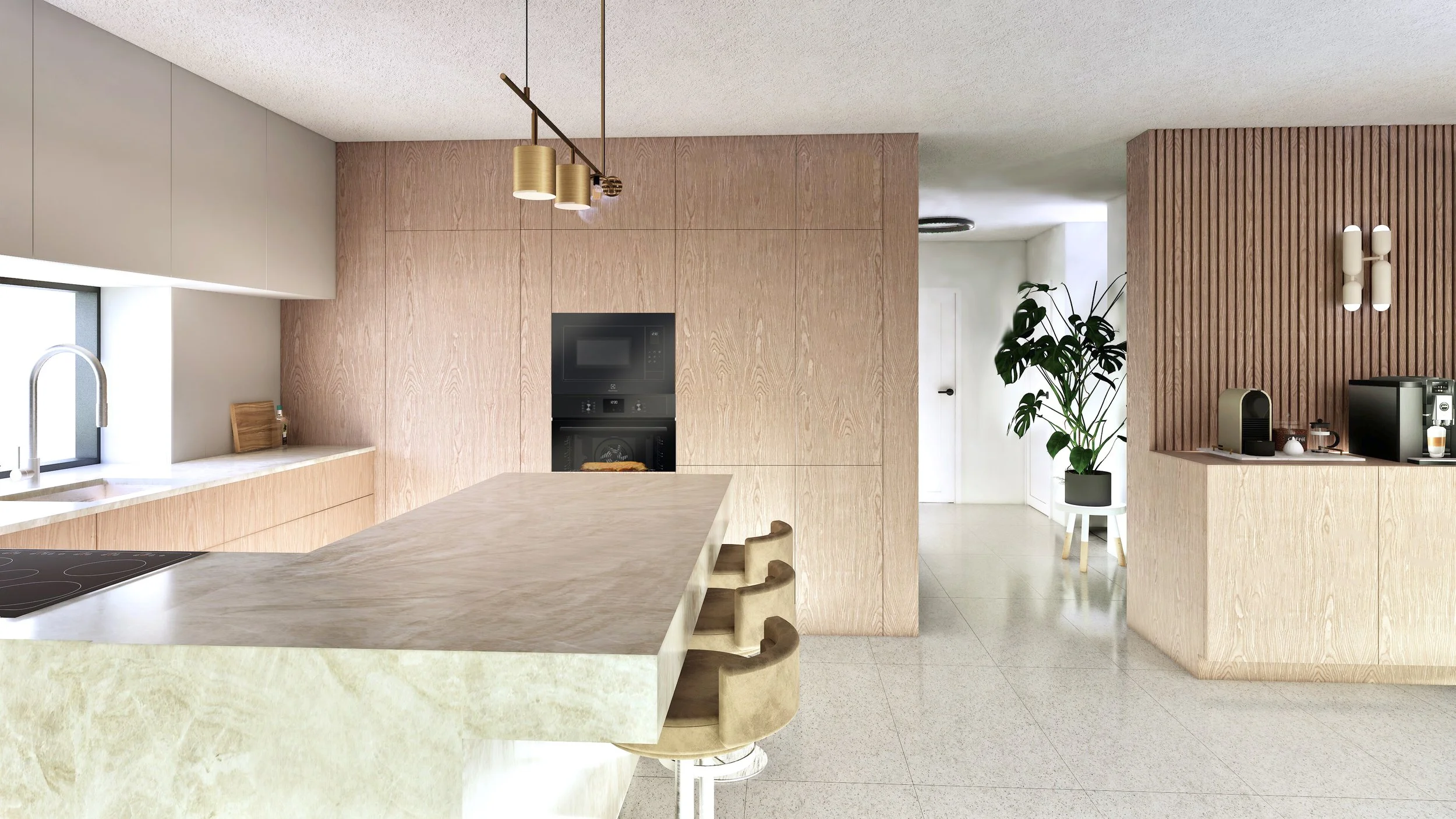 Modern kitchen with light wood cabinets, a marble kitchen island, a built-in microwave and oven, a small plant in a white pot, and a coffee station with a small coffee maker and a Keurig.