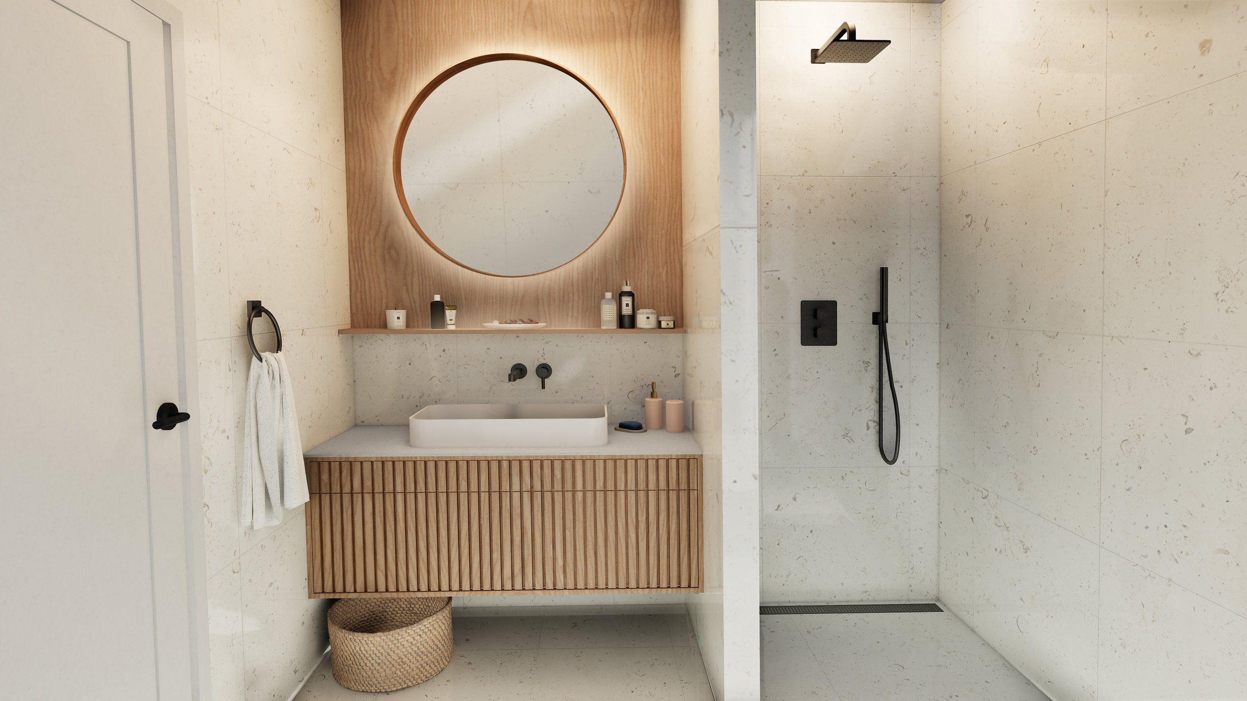 Modern bathroom with a backlit round mirror above a vanity with a white rectangular sink, black faucet, and wooden slatted cabinet. To the right, a walk-in shower with a black wall-mounted showerhead and handheld shower. Beige tile walls and floor, m