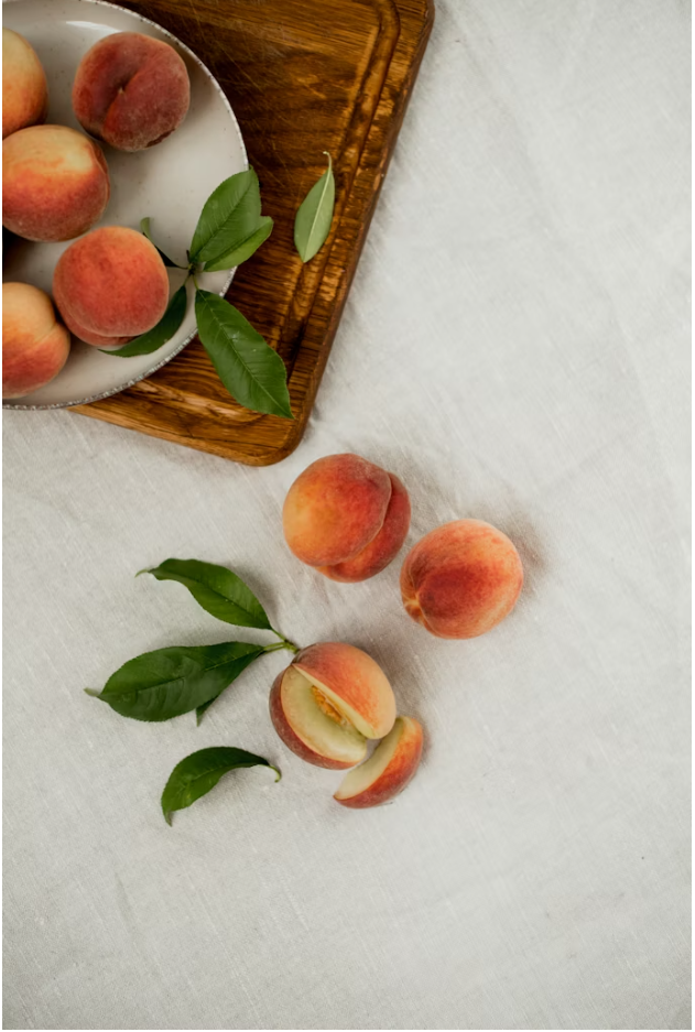 Peaches on a table