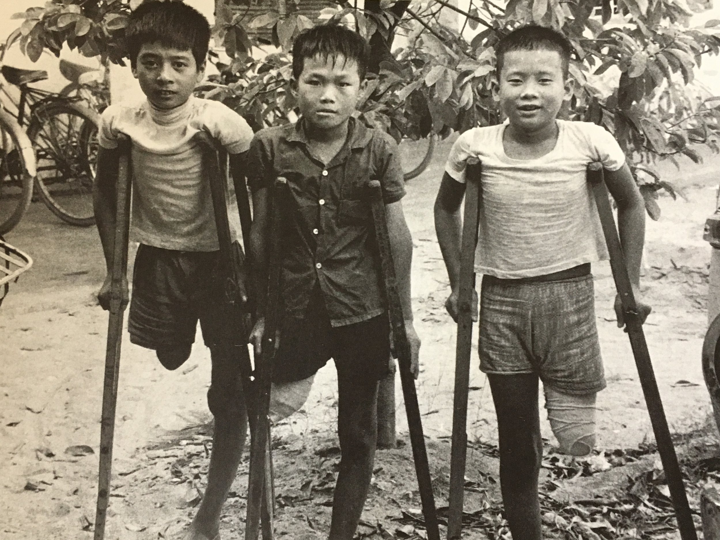 Three amputeed boys after the Vietnam War