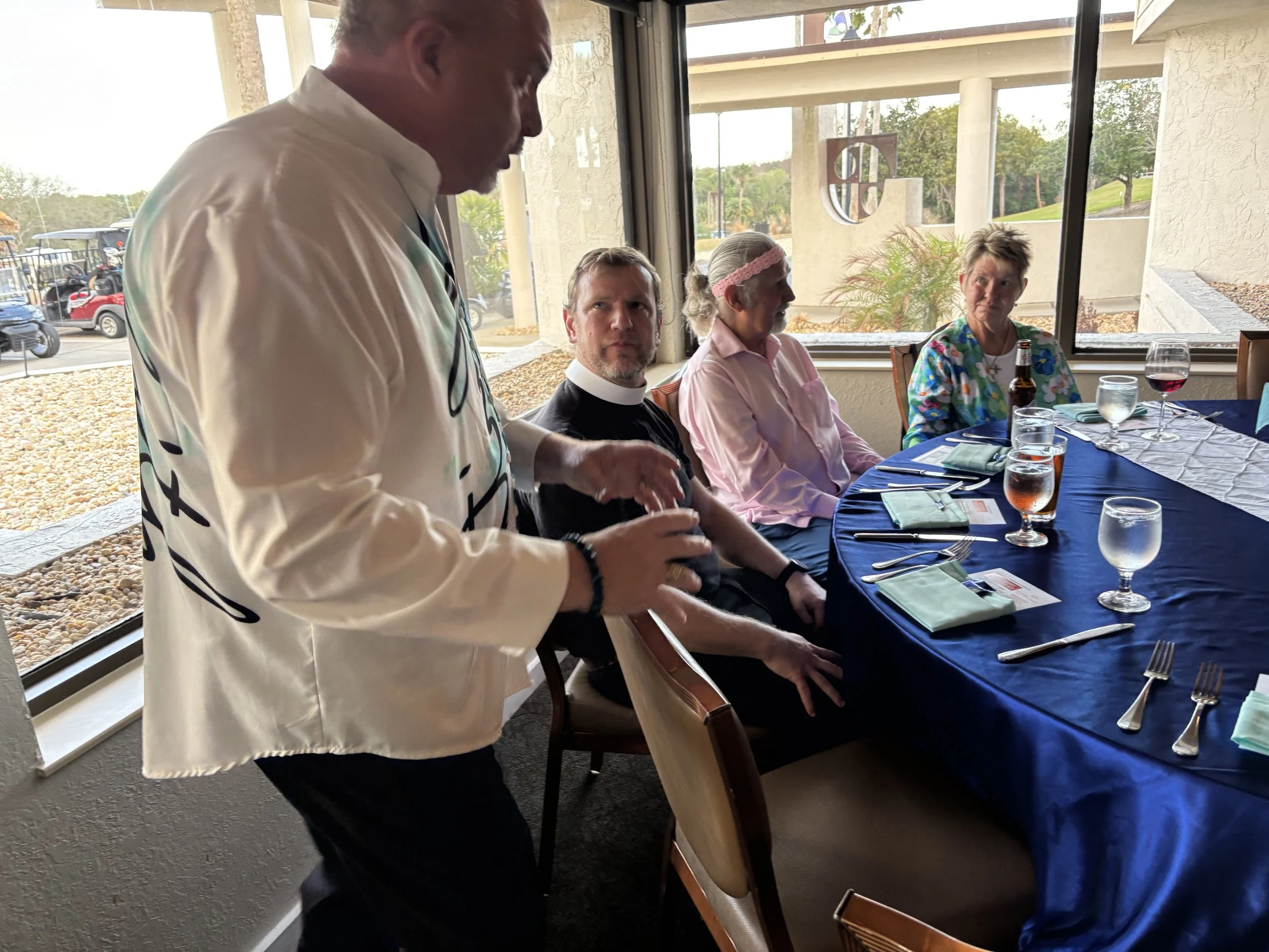 John Buchanan circulates among the crowd