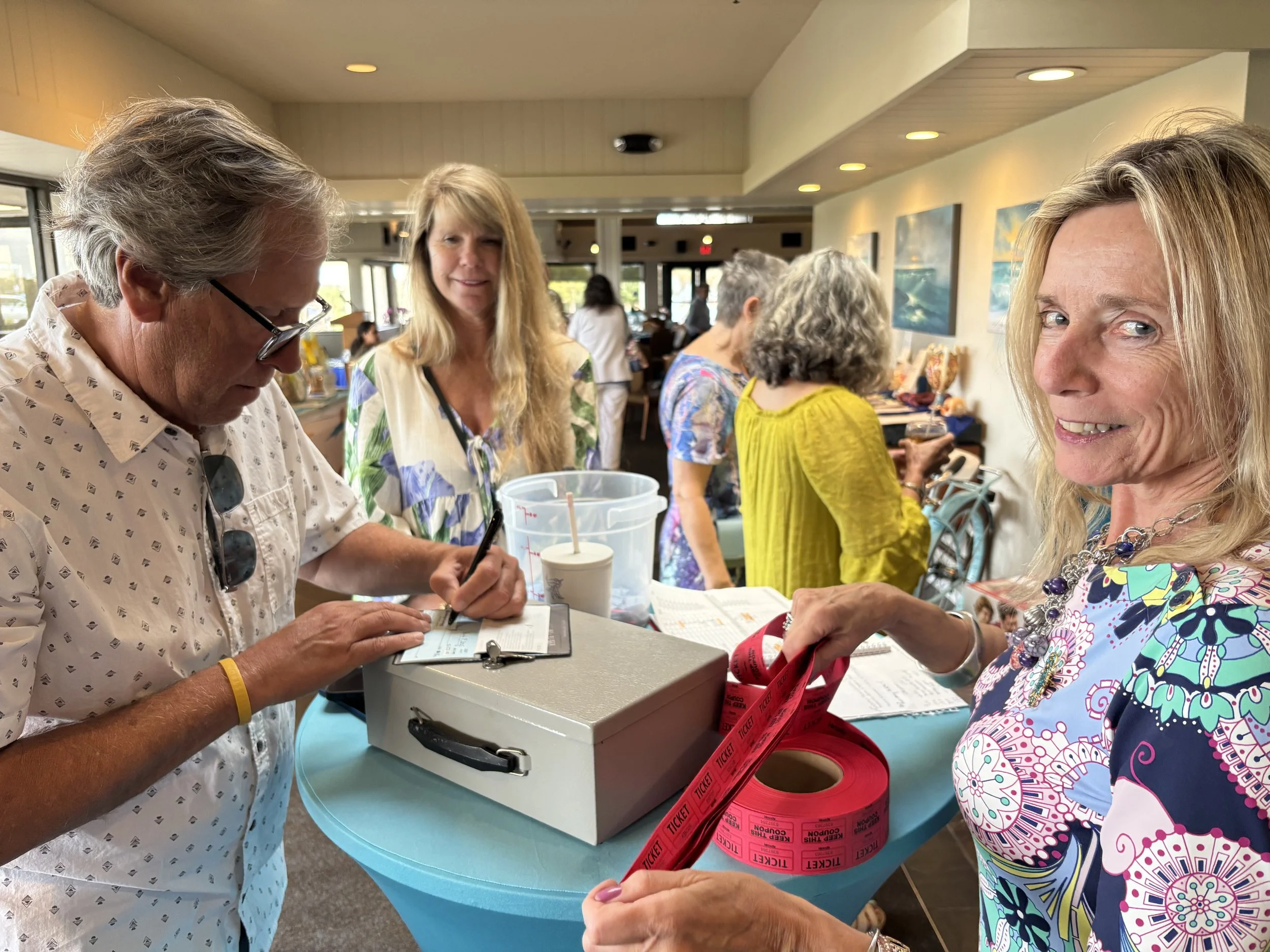 Carol sells raffle tickets