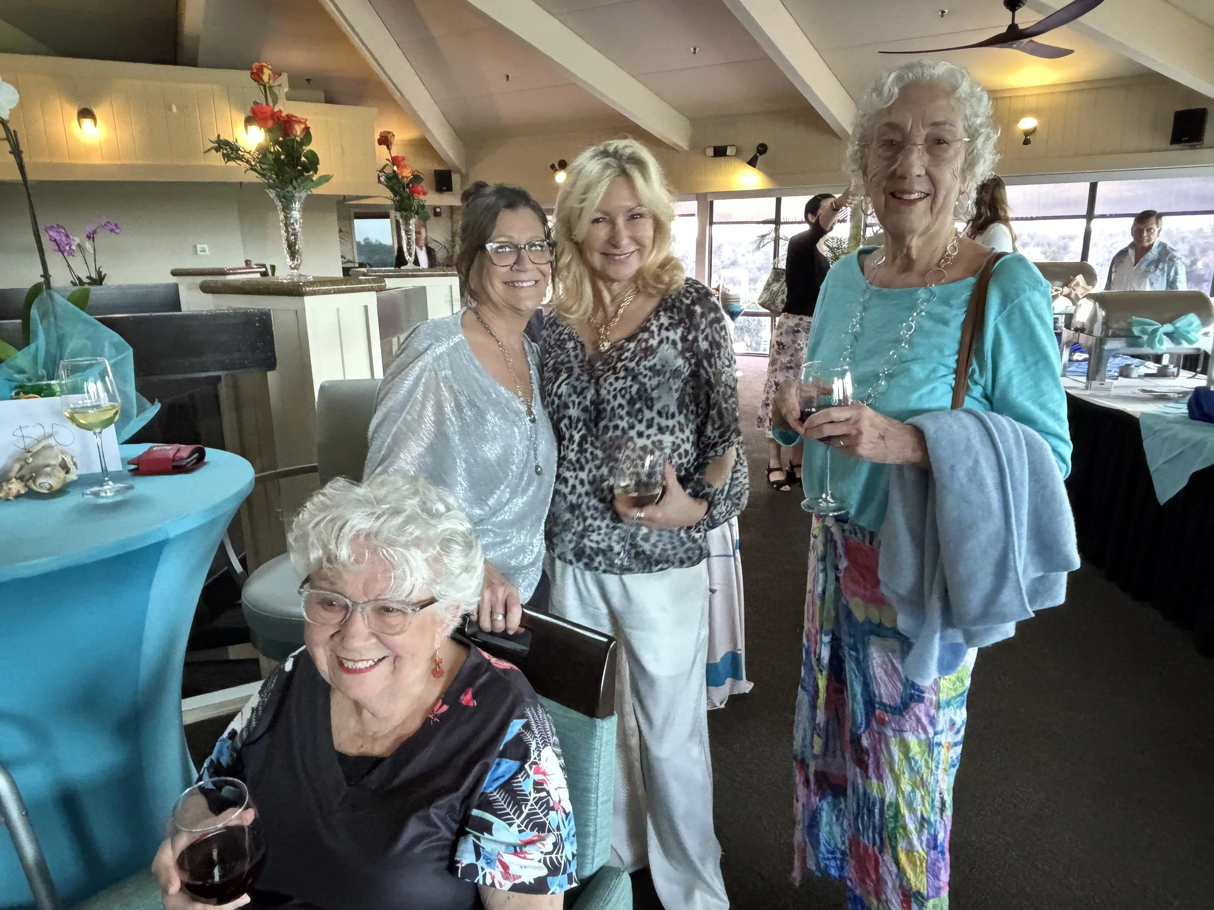 Lovely ladies share some wine 