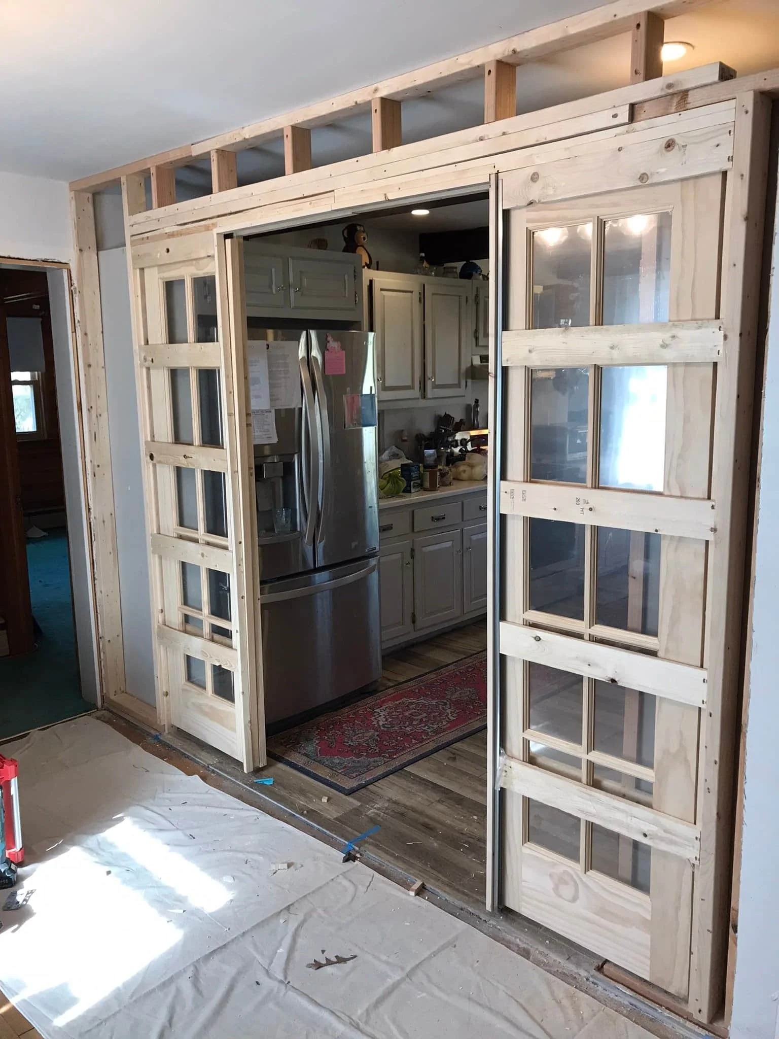 Custom carpentry completed by Sinicki Home Improvements in Medford lakes, NJ. French pocket doors.