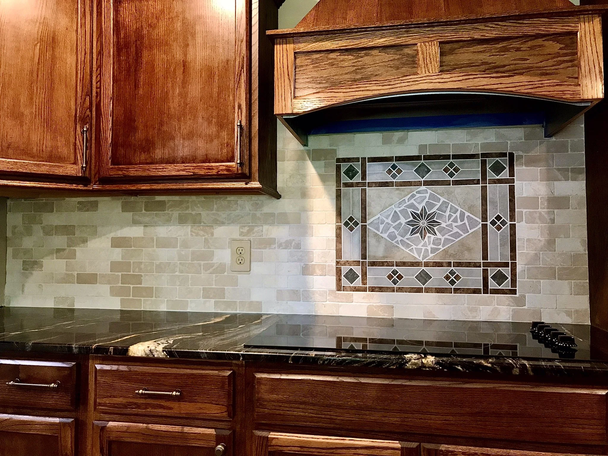 Kitchen tile backsplash by Sinicki Home Improvements