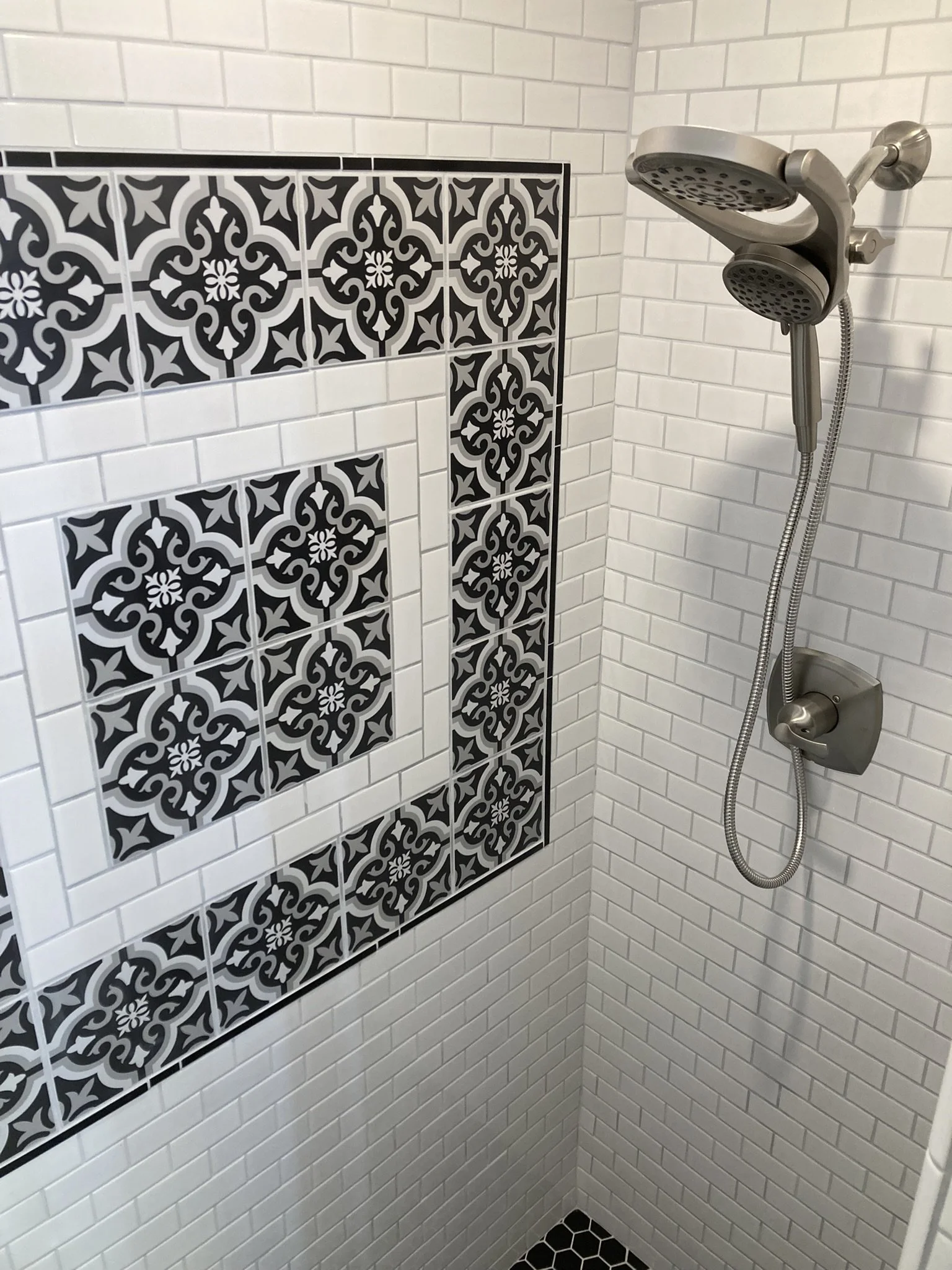 Complete bathroom remodel and shower tile work completed by Sinicki Home Improvements. 