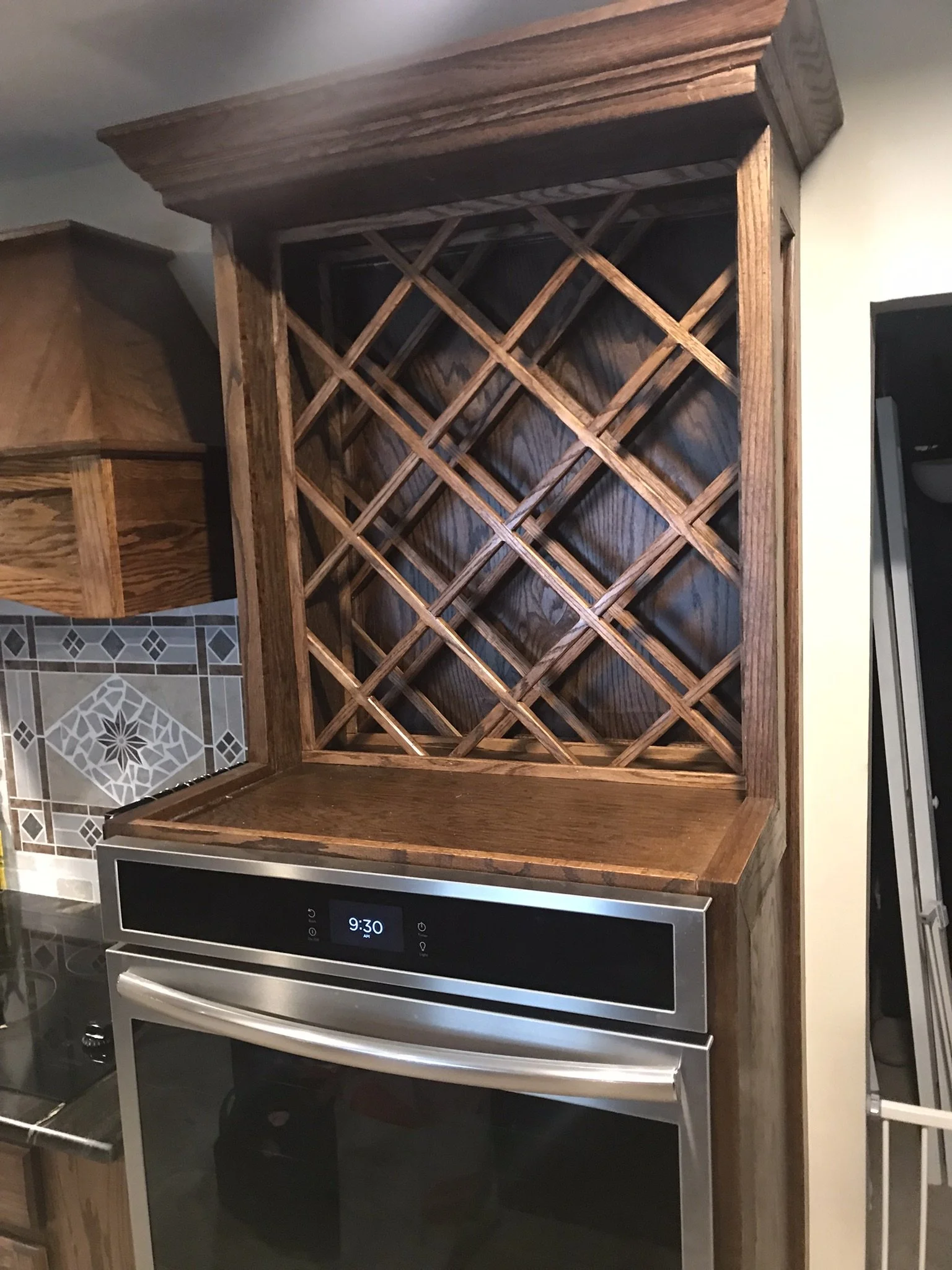 Custom Kitchen cabinetry and wine rack completed by Sinicki Home Improvements