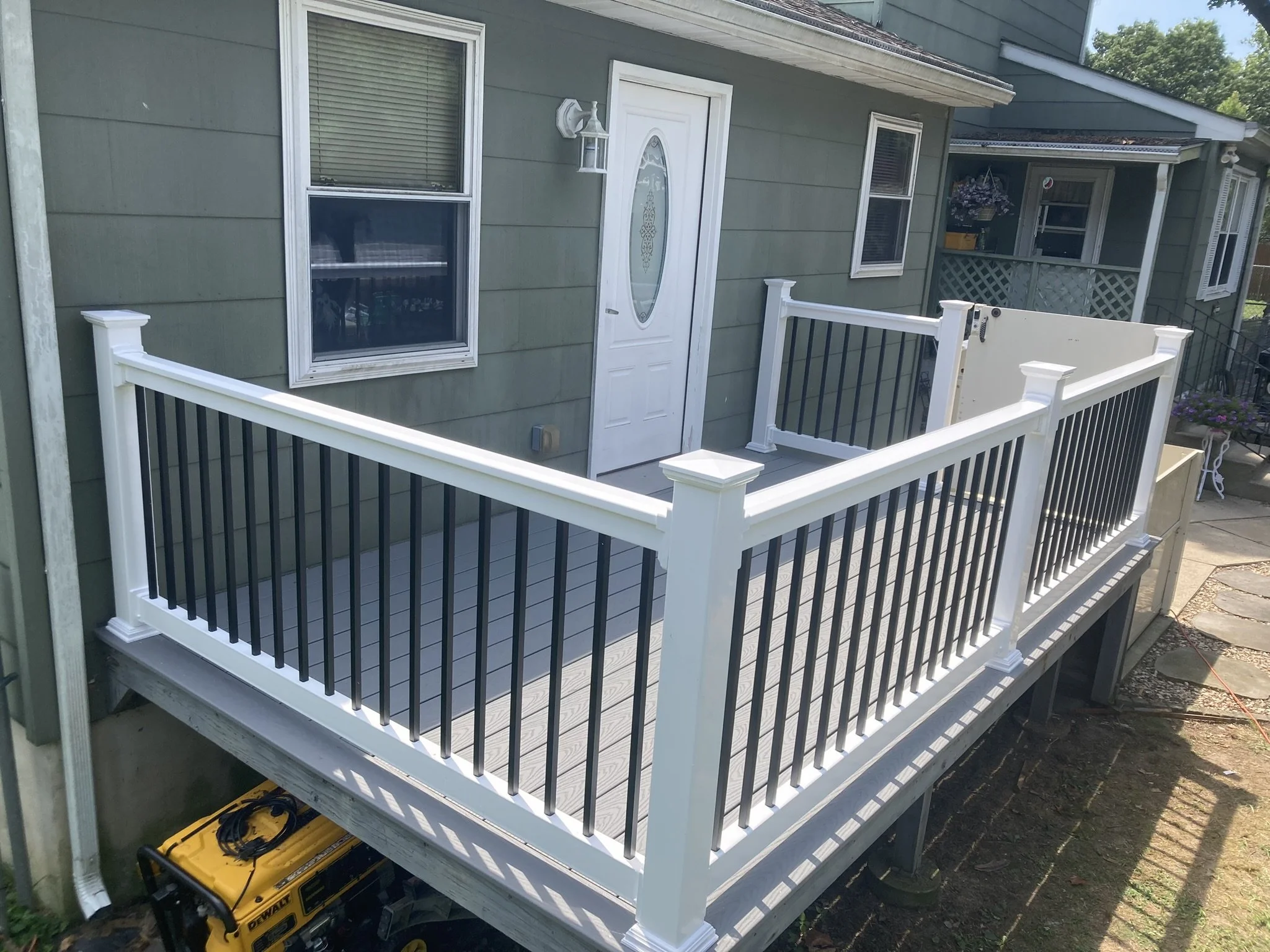 New deck surface and handrail by Sinicki Home Improvements