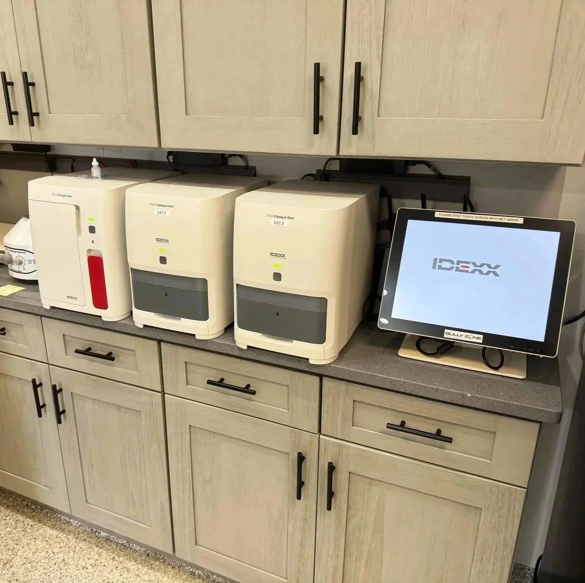 In-house lab equipment is shown in the veterinary treatment area at Veterinarian Pet Alliance in Newark.