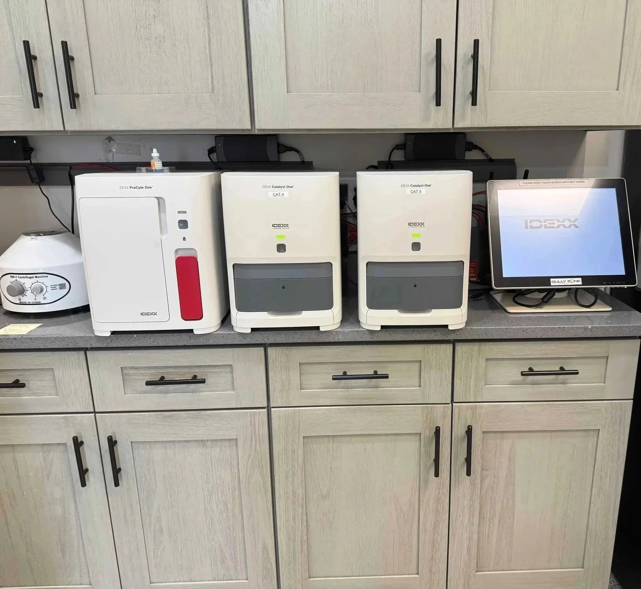 In-house veterinary lab equipment in the clinic at The Veterinarian Pet Alliance in Newark, NJ.