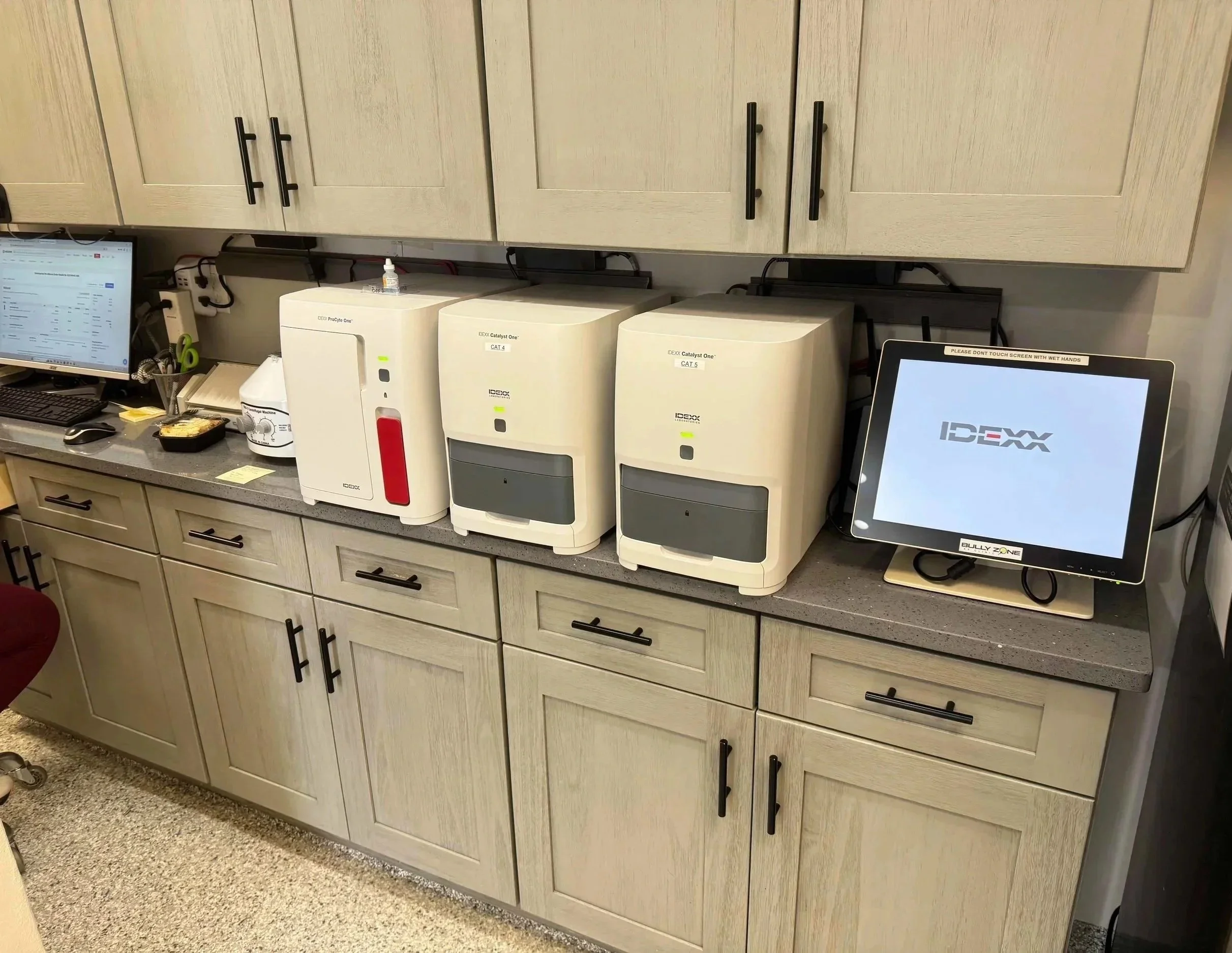 In-house veterinary lab equipment used for pet medication safety monitoring at Veterinarian Pet Alliance in Newark, NJ.