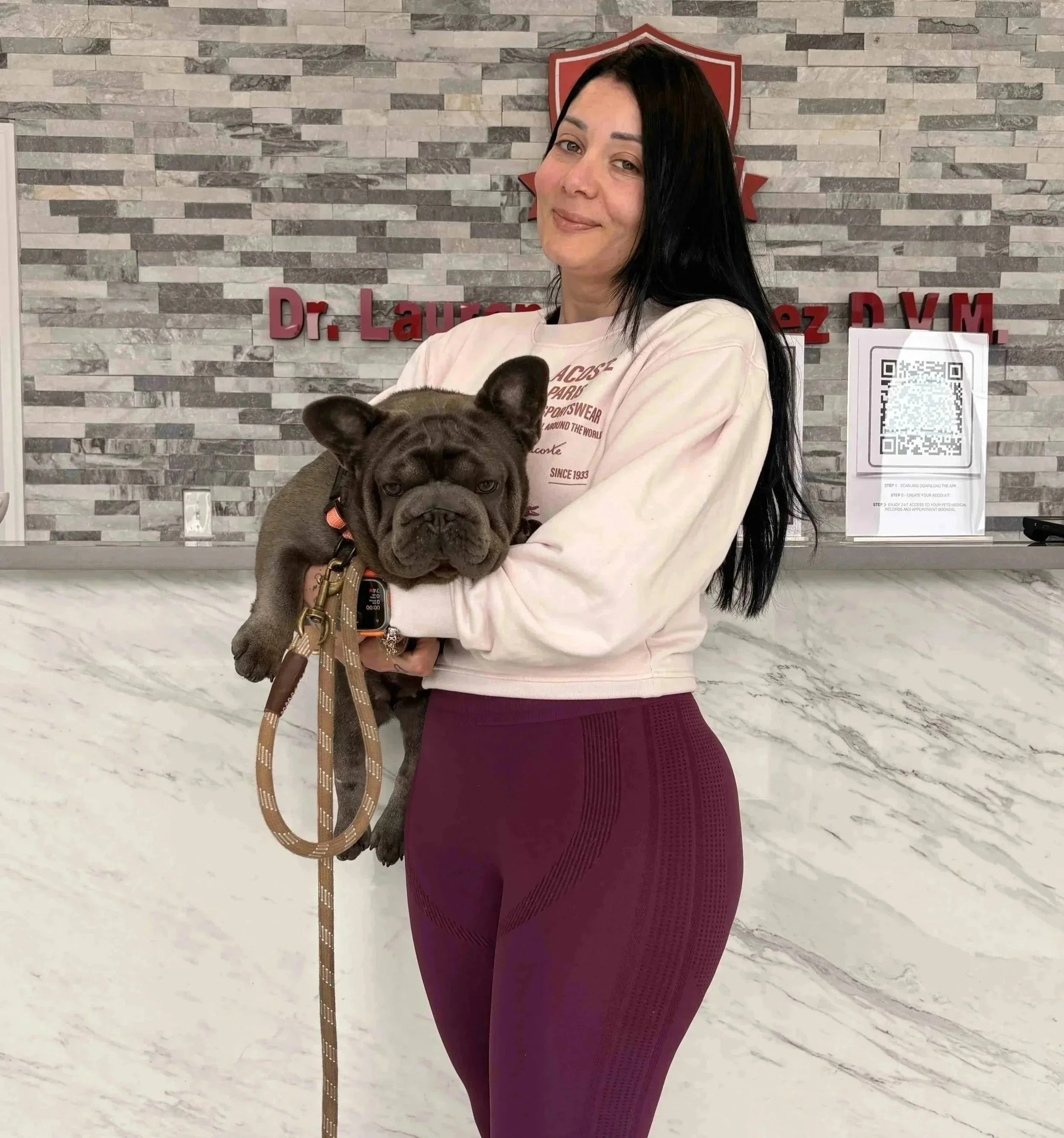 Pet owner visiting a Newark NJ veterinarian for dog eye care