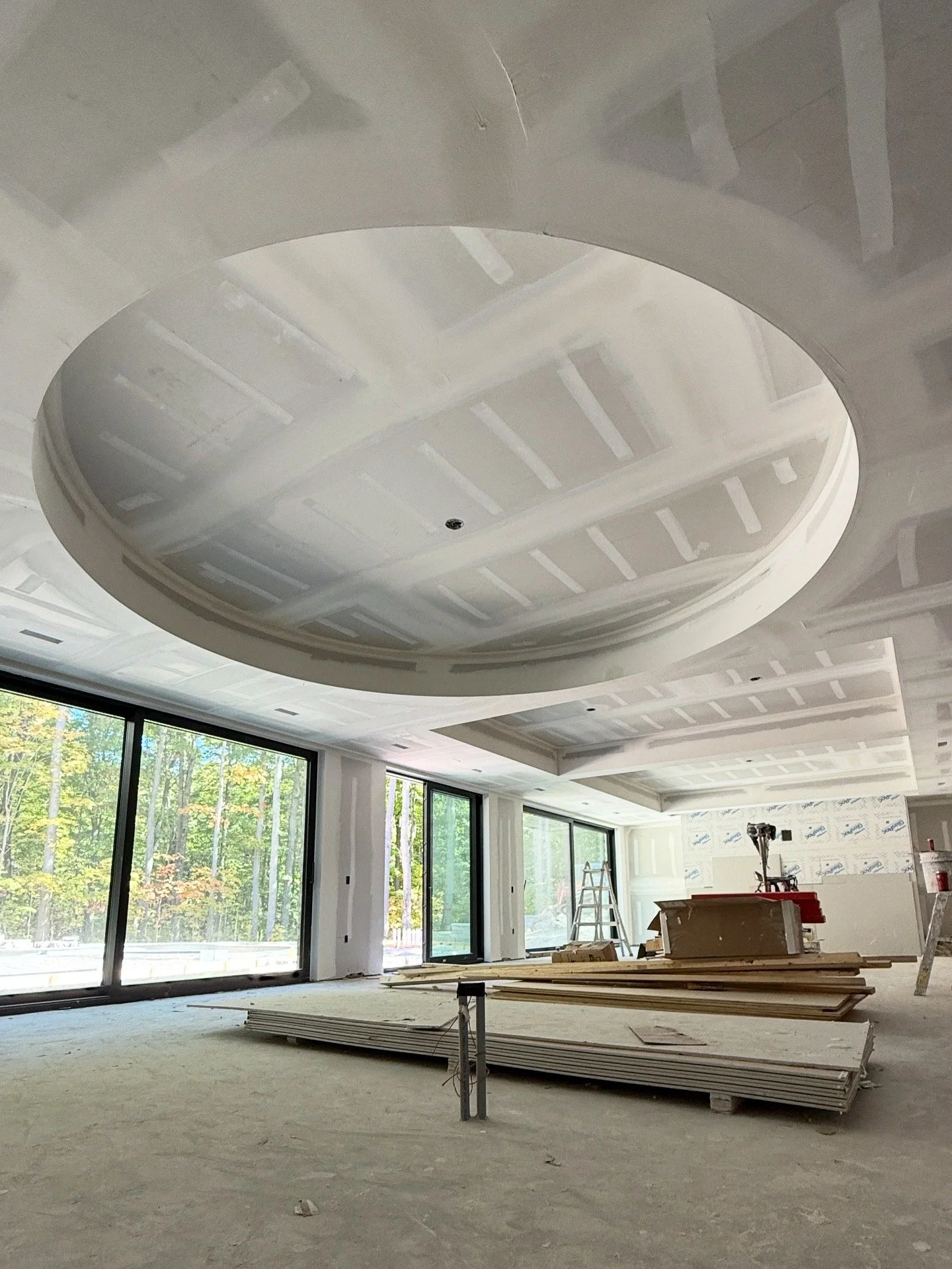 Commercial interior drywall buildout in Muskoka during large-scale construction