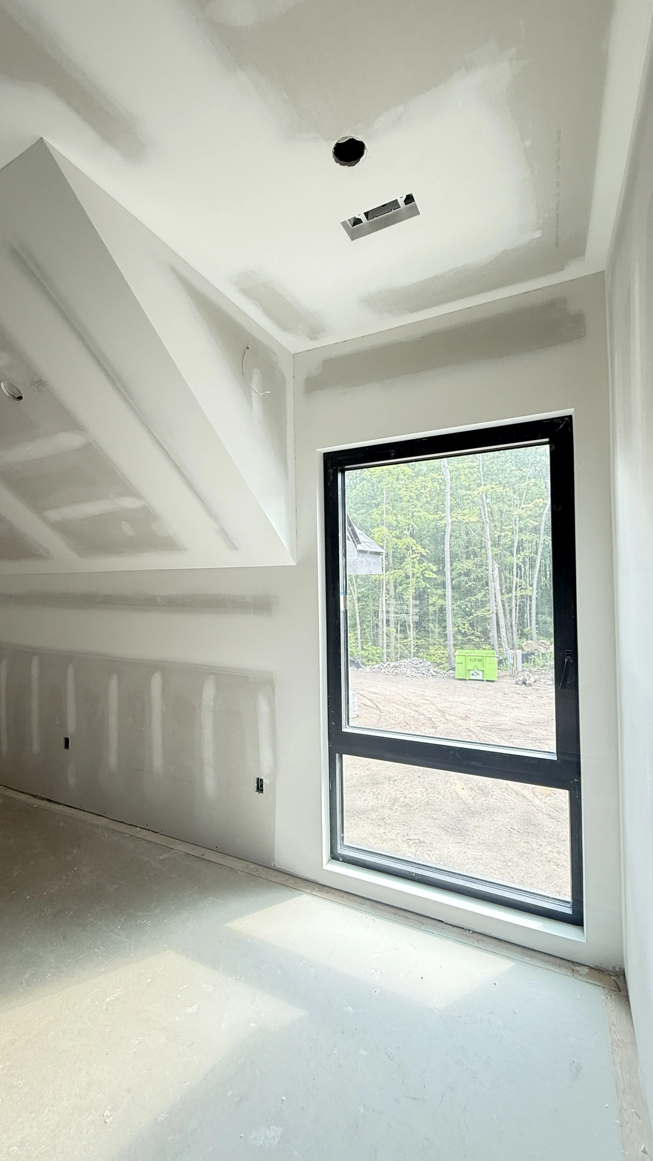 Modern drywall finish windows in a custom home on lake muskoka 