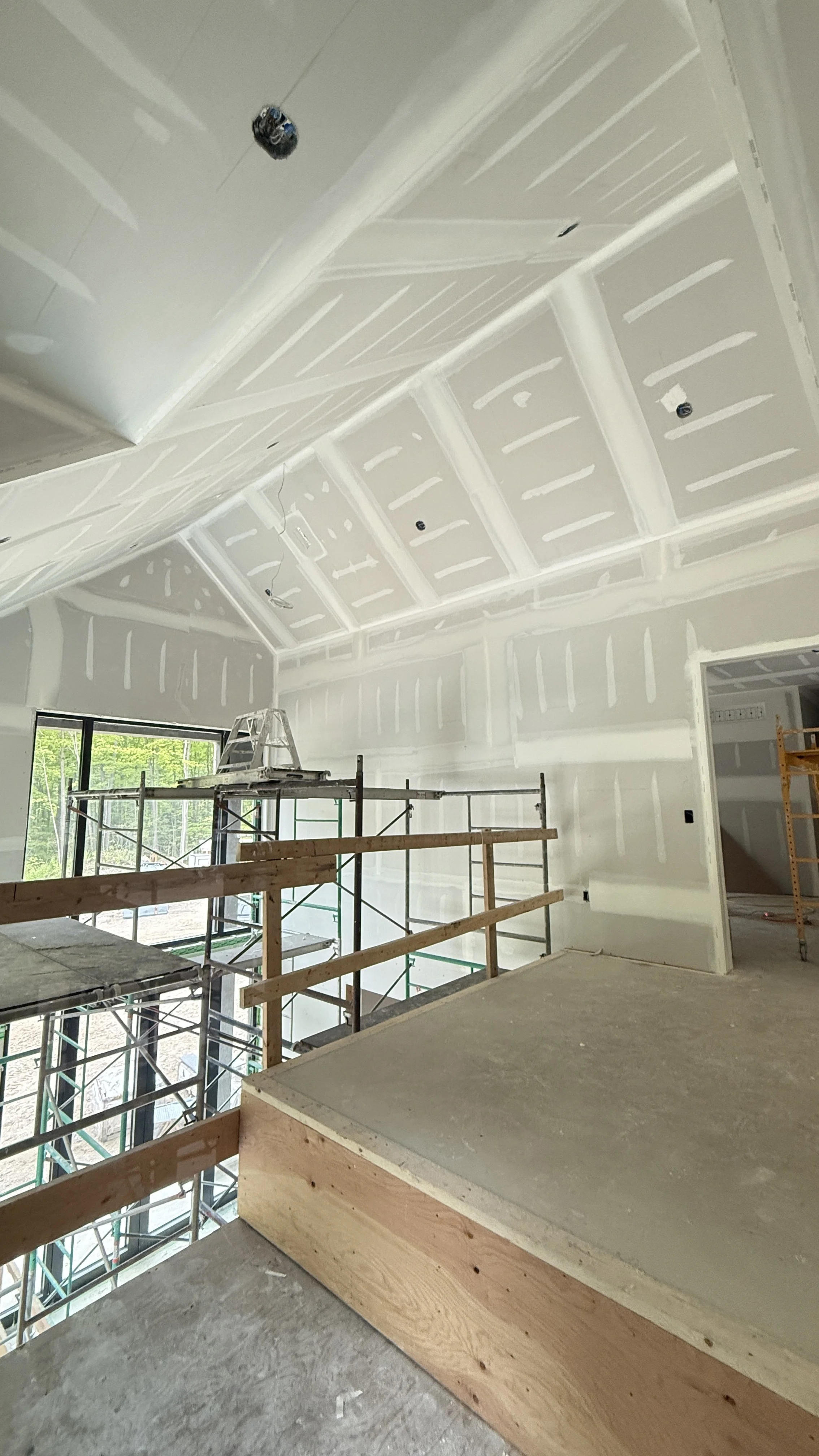Custom home drywall installation and interior painting in Muskoka