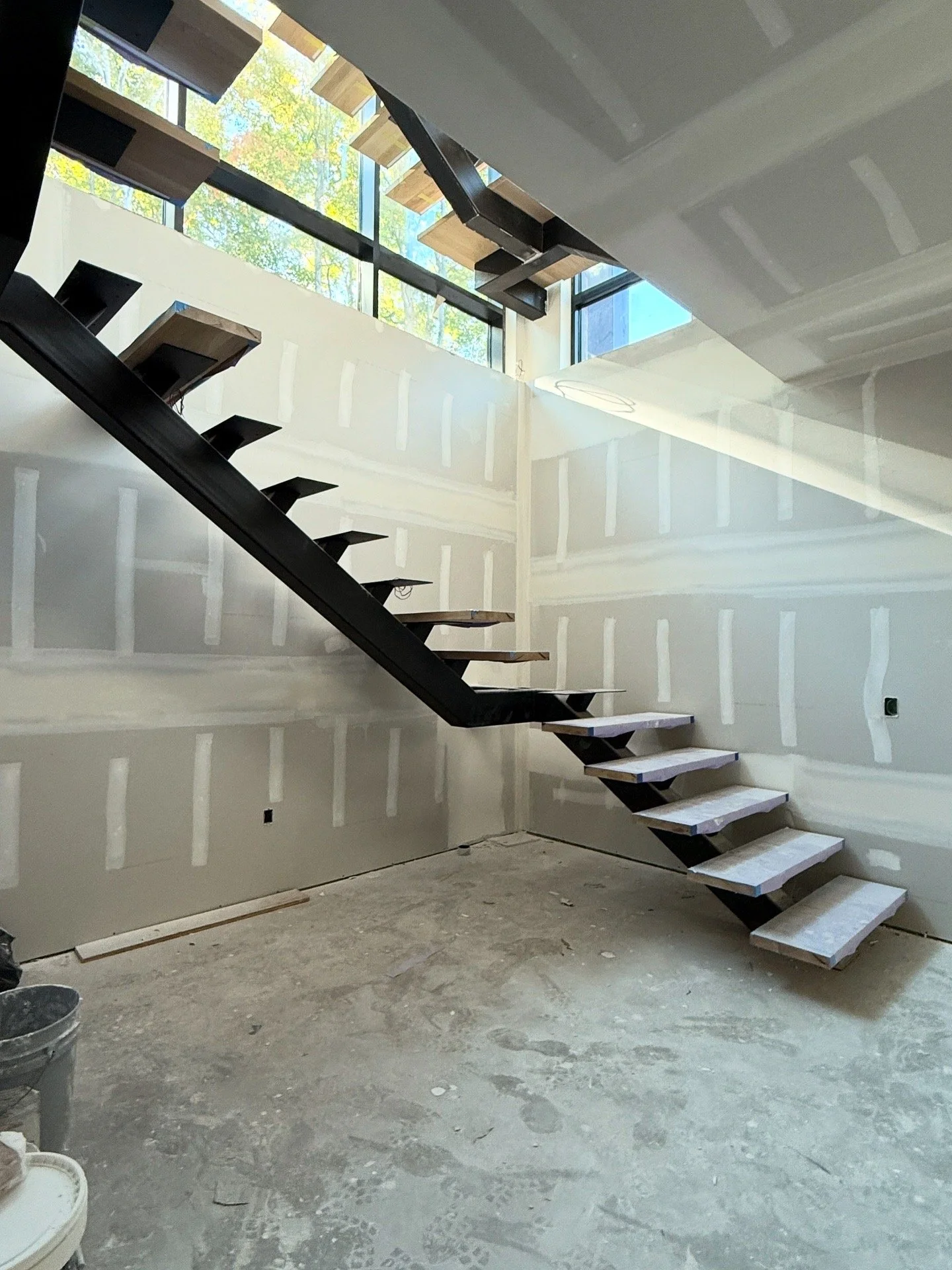 Open-concept high-end residential drywall installation in muskoka bracebridge 