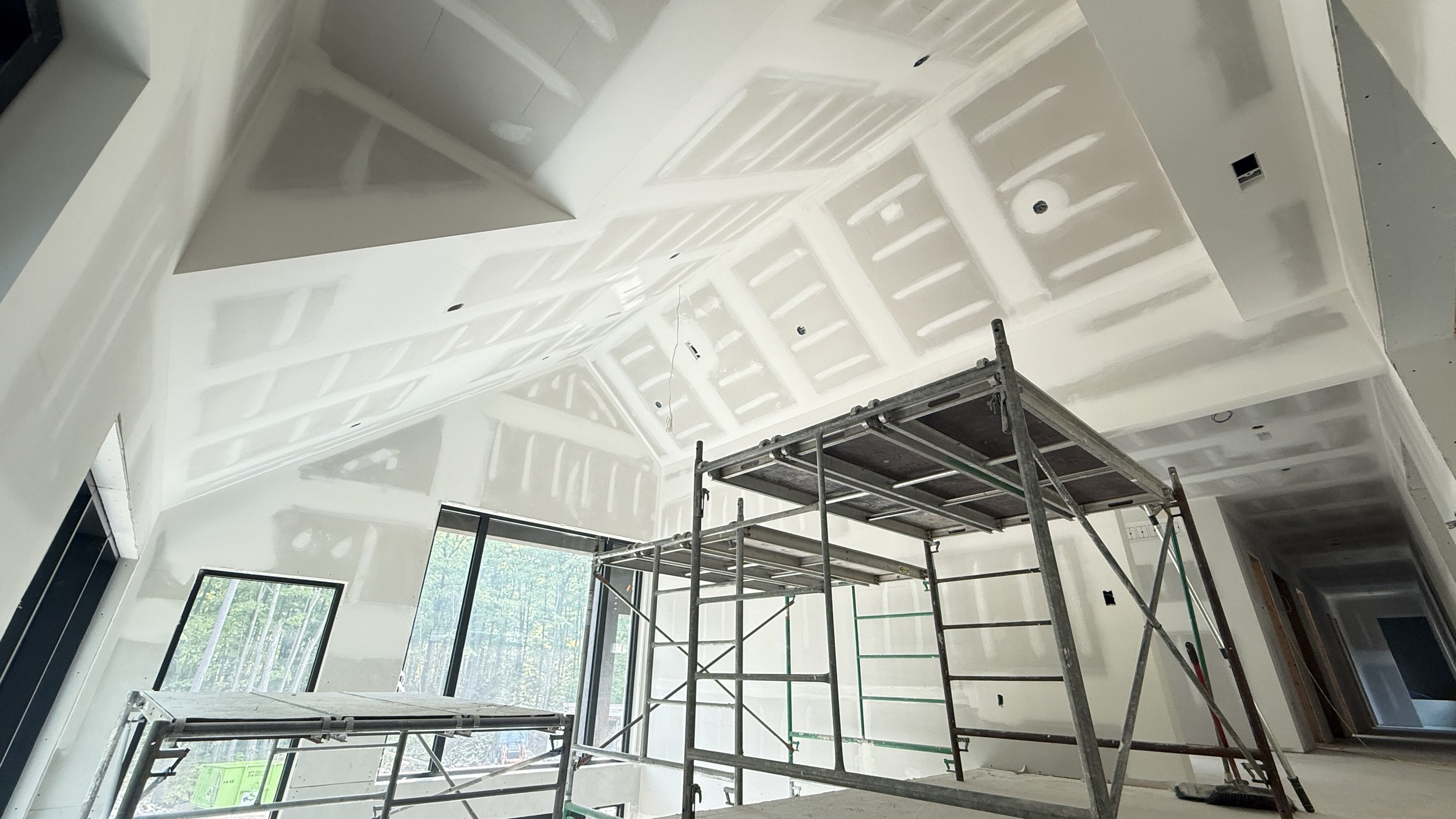 Modern drywall contractor in muskoka custom home cathedral ceilings in Port severn 