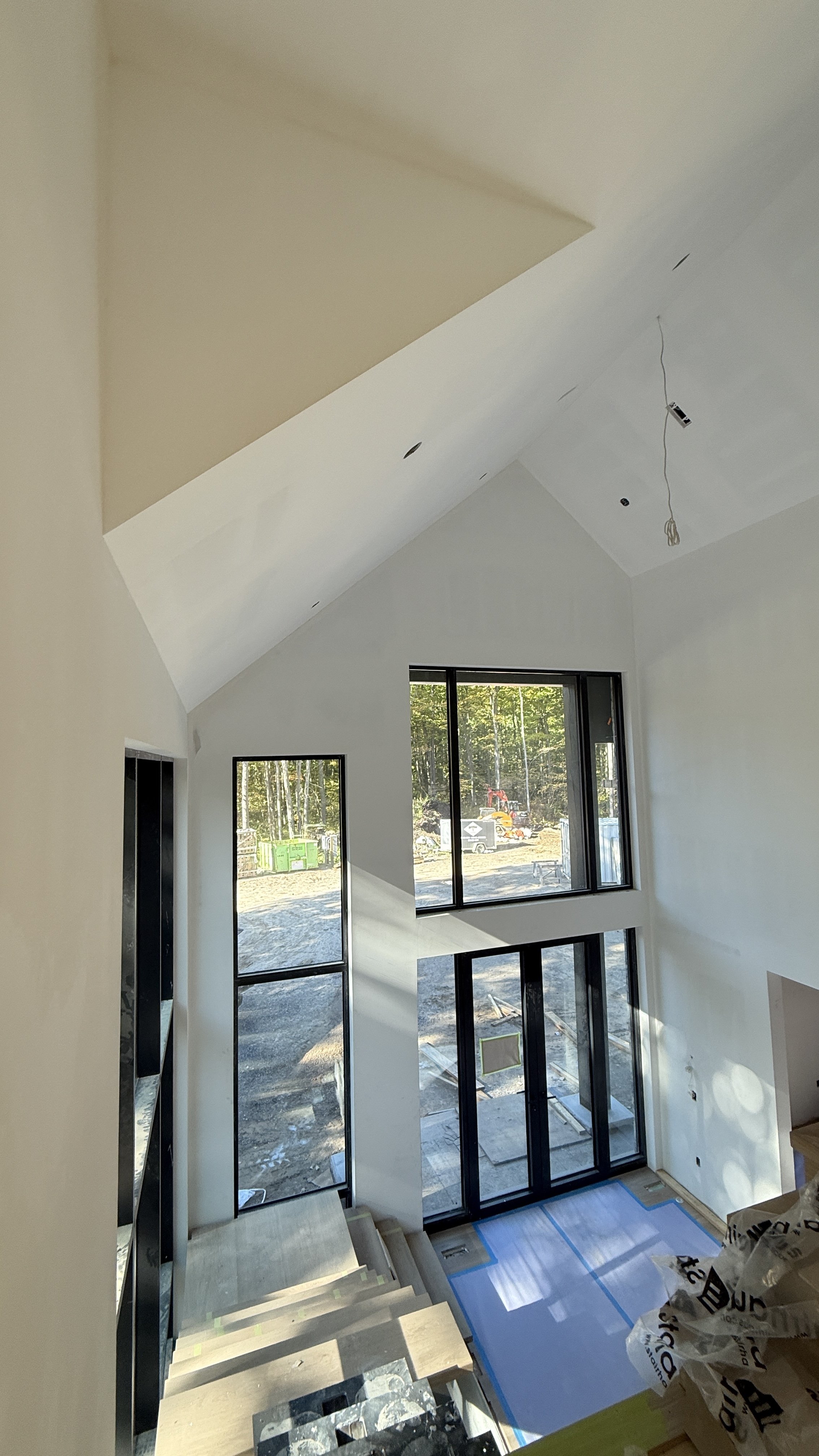 Drywall finishing prepared for interior painting on high-end Muskoka project