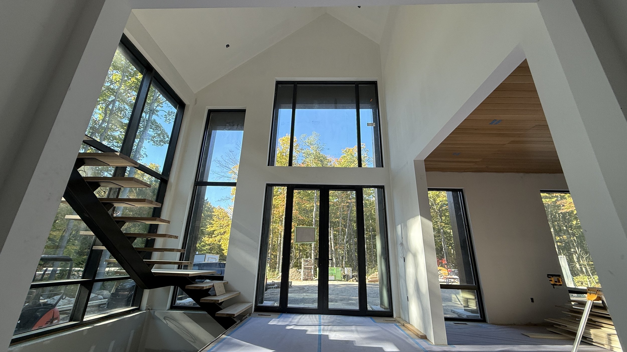 Interior painting following drywall installation on Muskoka residential project
