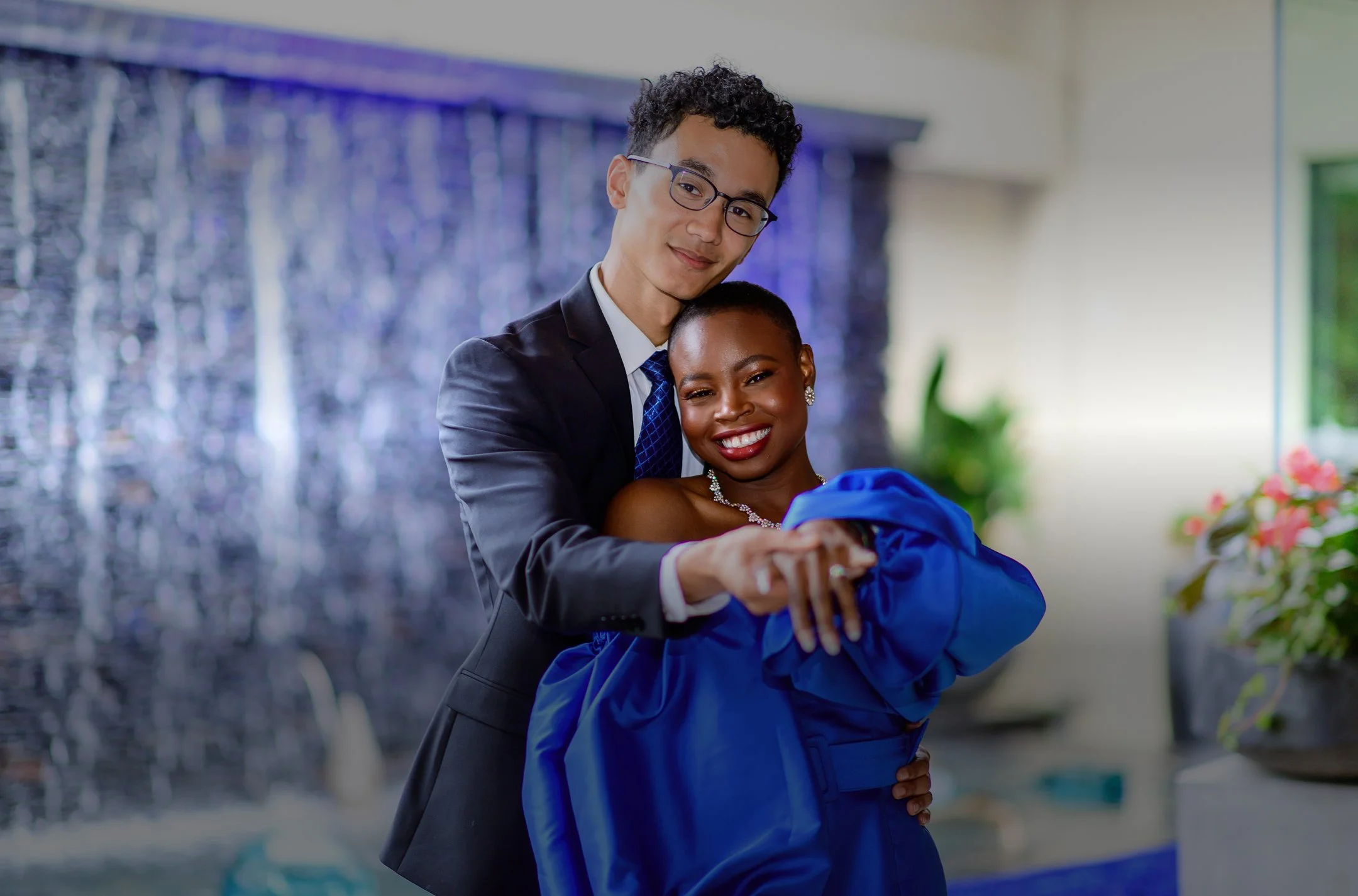 Robert and Mope posing at a engagement reception.