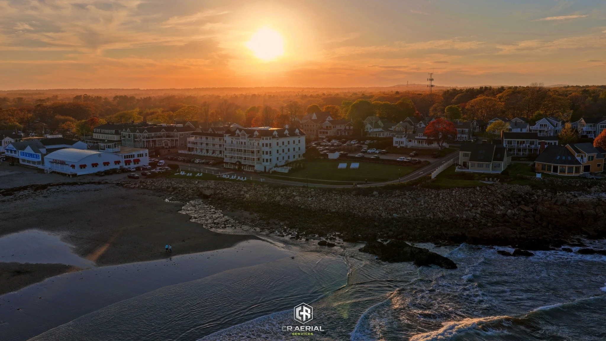 🌅 Short Sands Beach at sunset never disappoints.

Golden light spills across the shoreline as waves roll onto the sand and another beautiful day comes to a close in York, Maine. From above, it's easy to see why this iconic stretch of coastline has c
