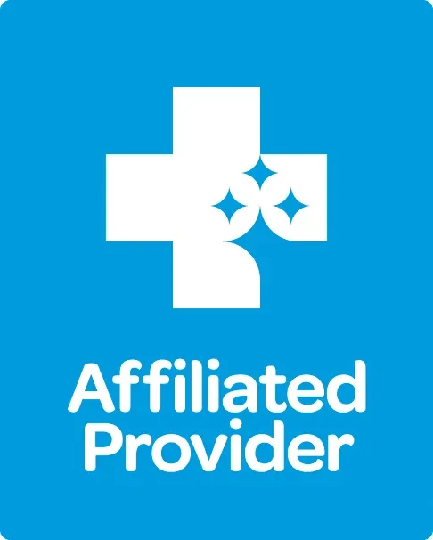 White medical cross with sparkling stars on a blue background, with the text "Affiliated Provider" underneath.