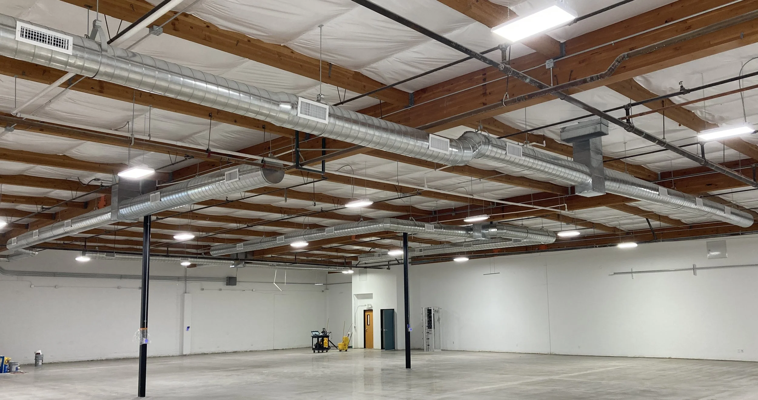 HVAC ducting installed in a commercial wearhouse by Fallbrook Mechanical