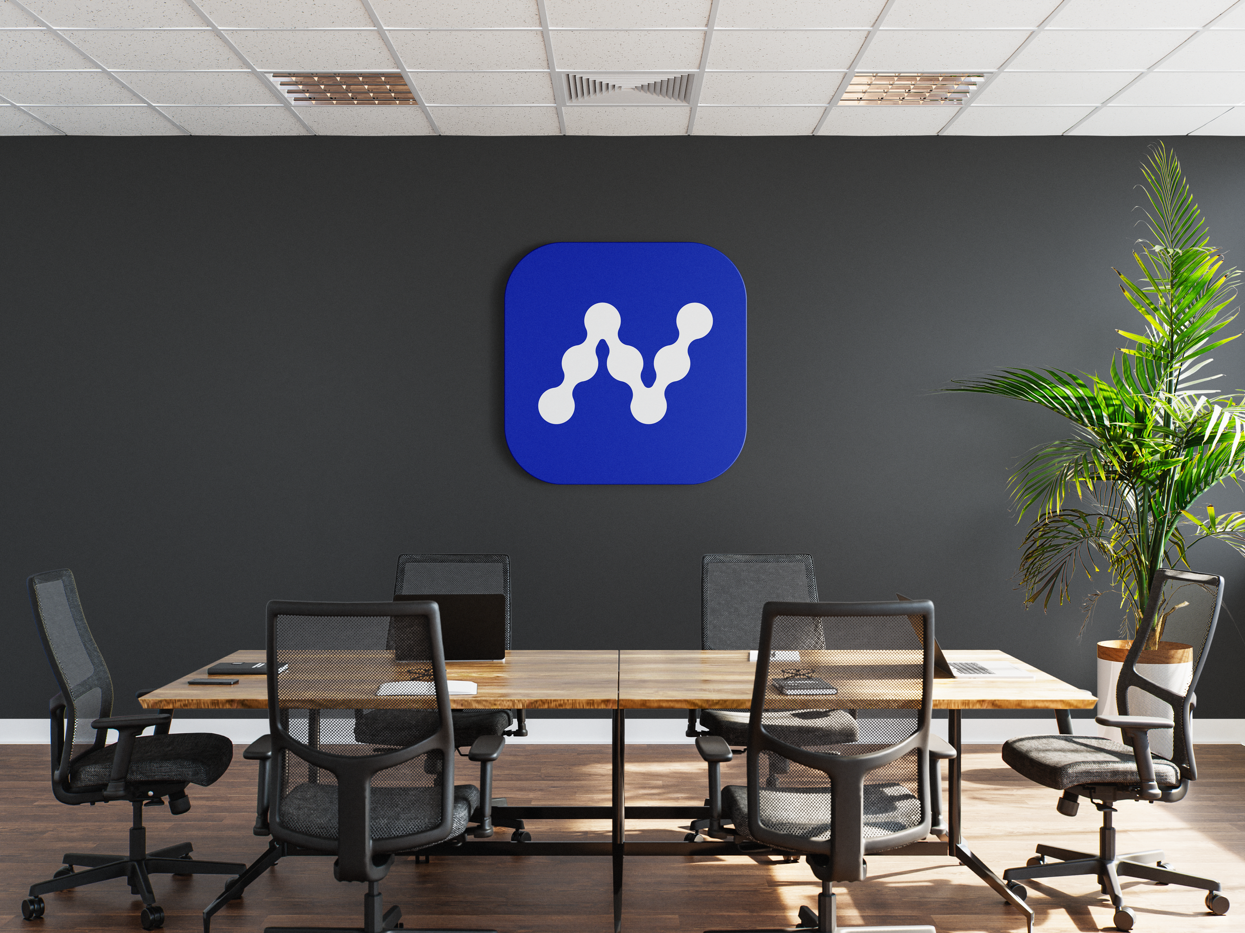 Logo_in_Conference_Room_Mockup_2 copy.png