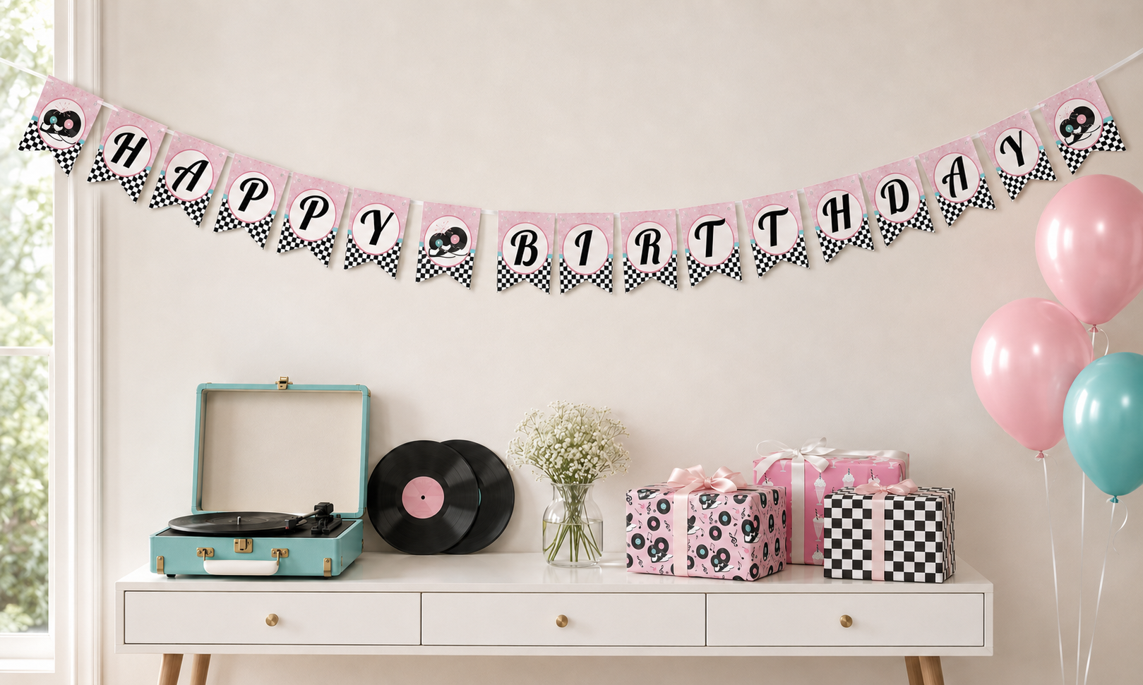 1950s birthday display with retro bunting, record player, balloons, and coordinating wrapped gifts.
