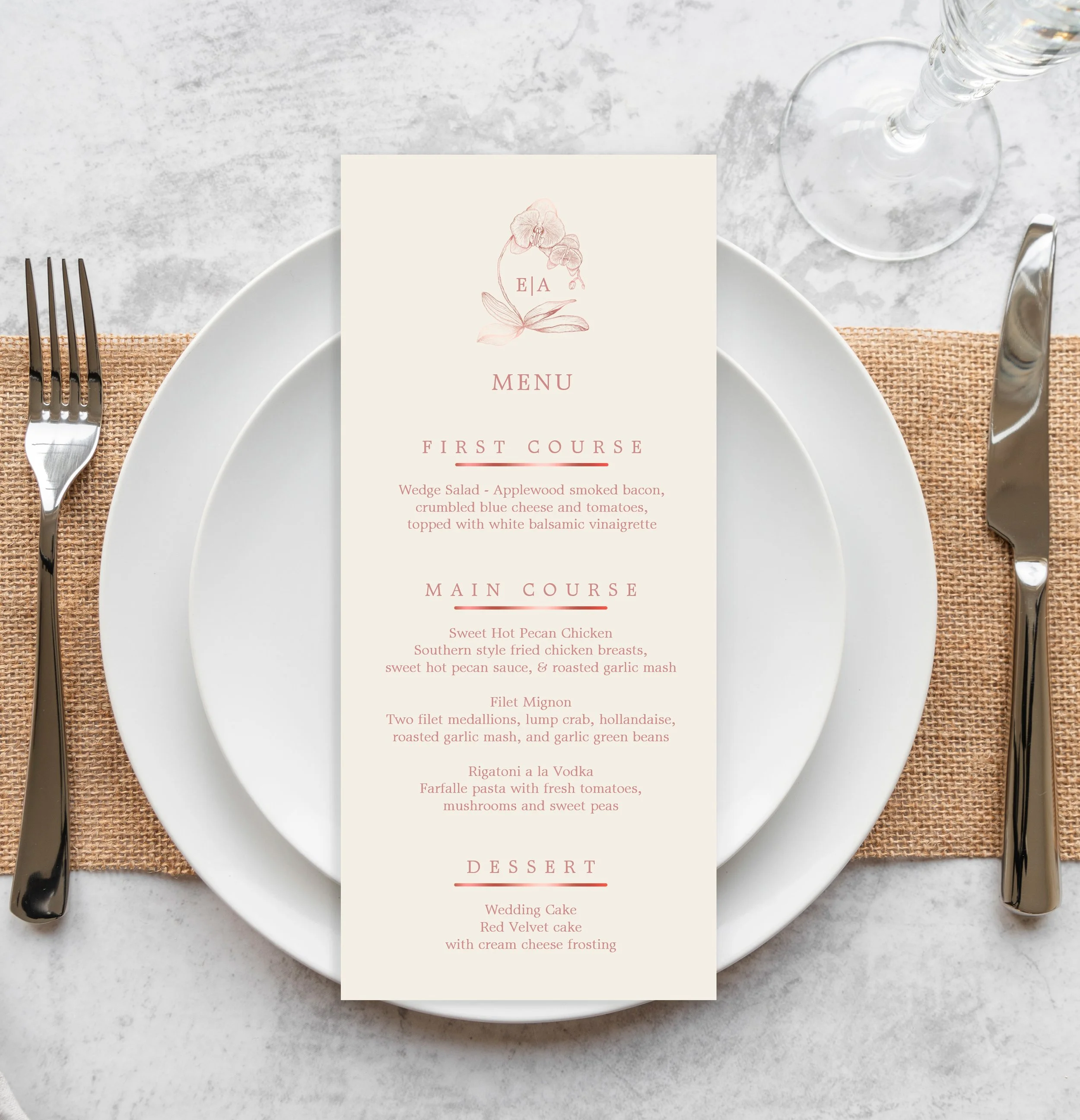 Elegant orchid wedding menu card displayed on a formal place setting.