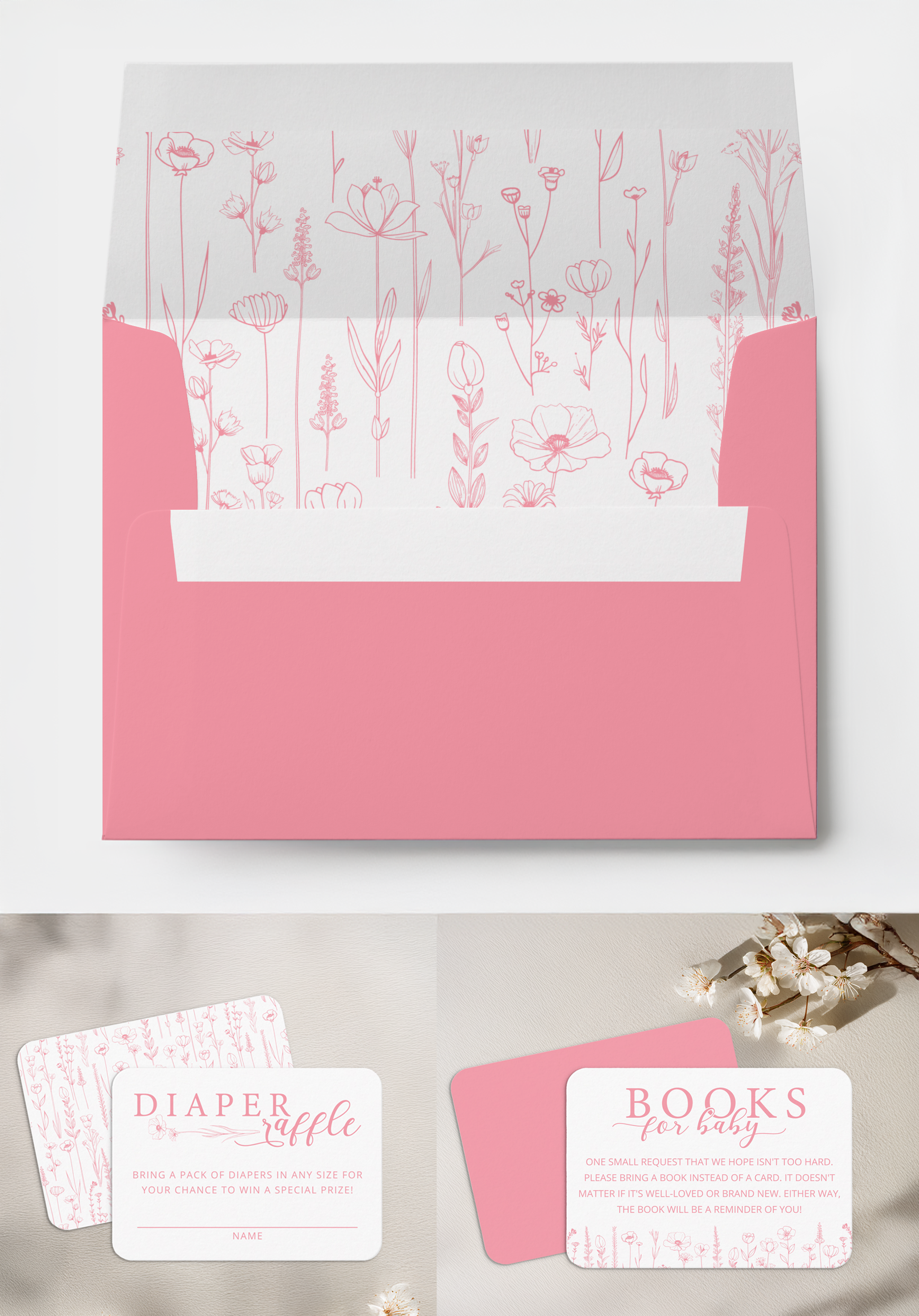 Dusty pink wildflower baby shower envelope liner with matching diaper raffle and books for baby insert cards.