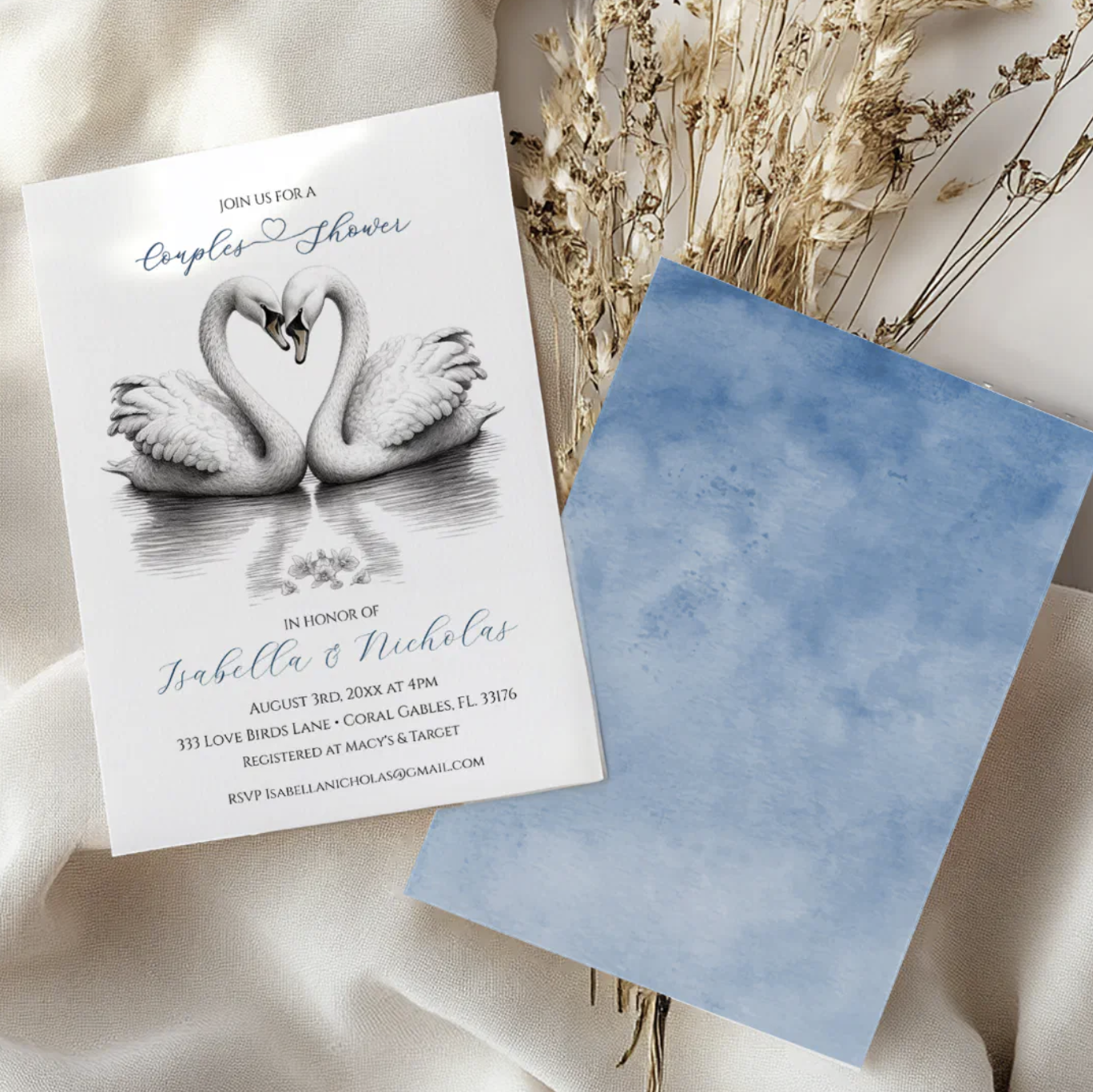 Romantic swan couples bridal shower invitation with soft neutral fabric styling and delicate dried floral accents.