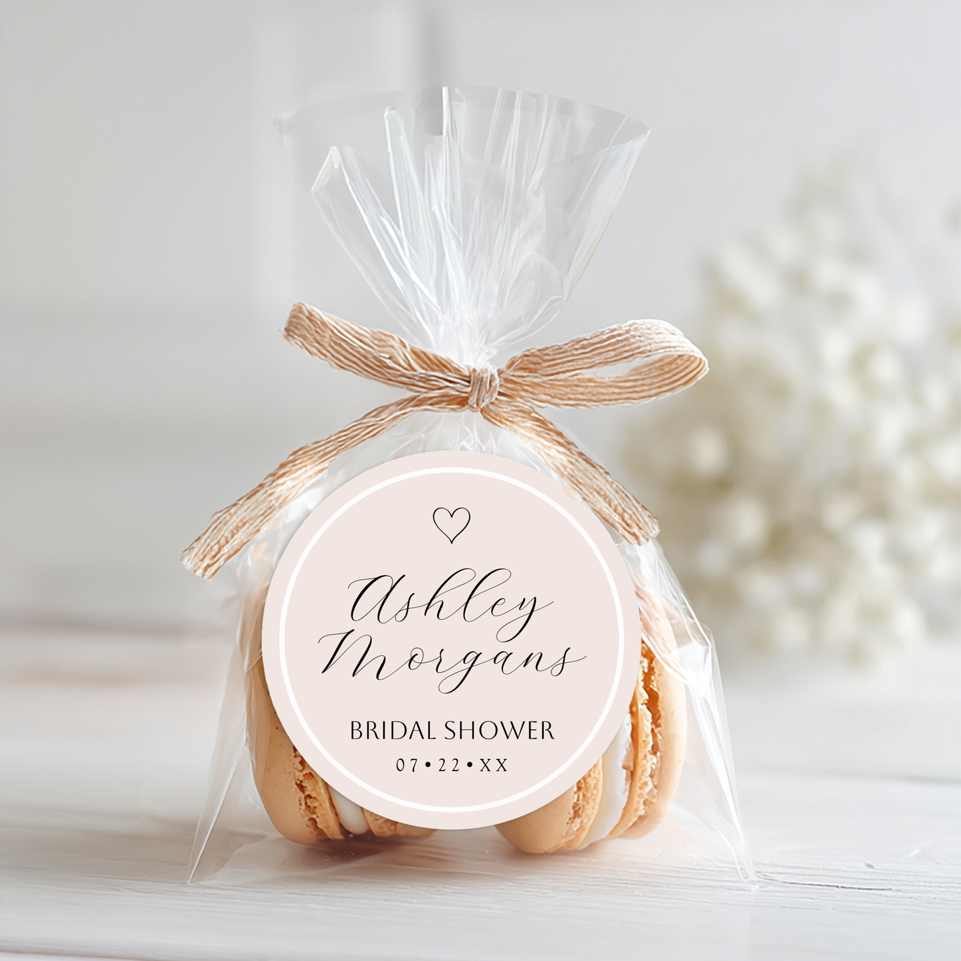 Bridal shower favor table styled with minimalist favor sticker and neutral decor for a modern celebration.