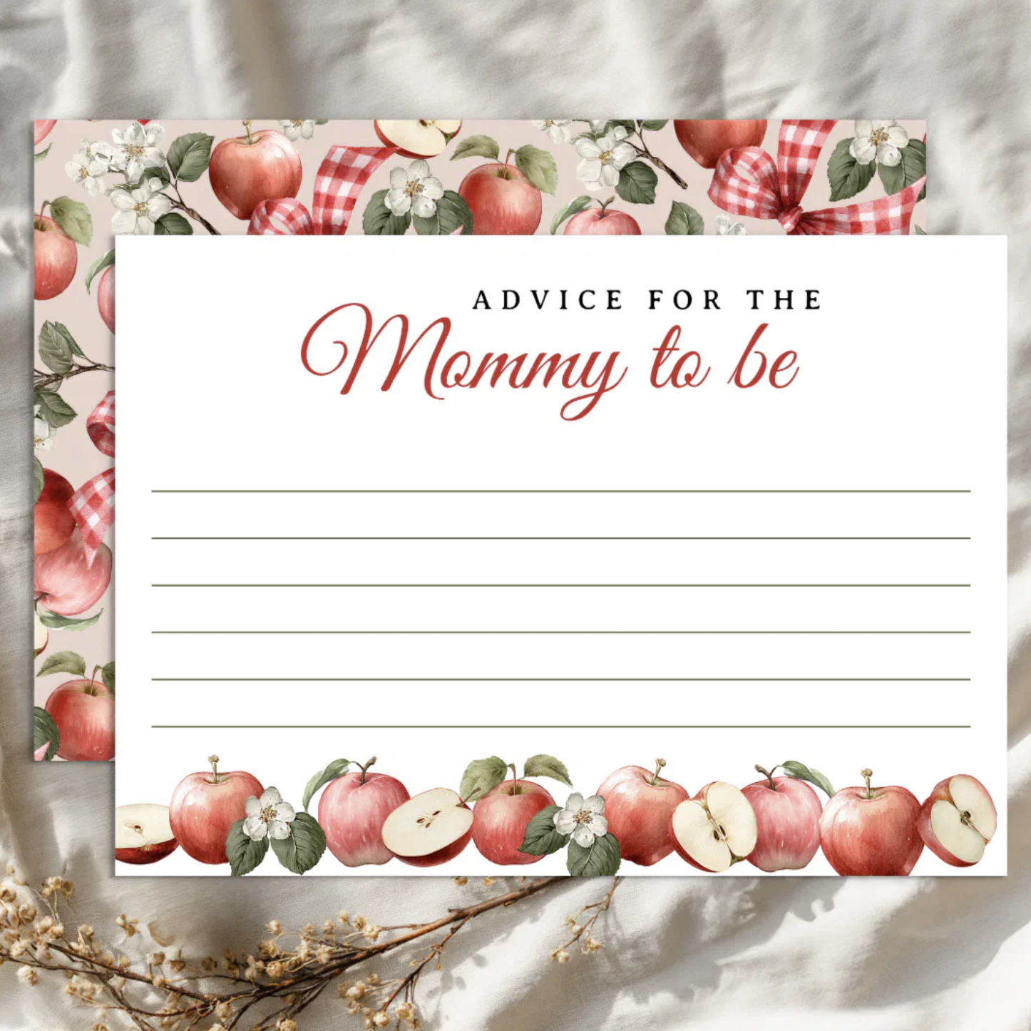 Apple-themed baby shower Advice for the Mommy-to-Be card with watercolor apples, blossom accents, lined writing space, and coordinating patterned backing card on soft fabric background.