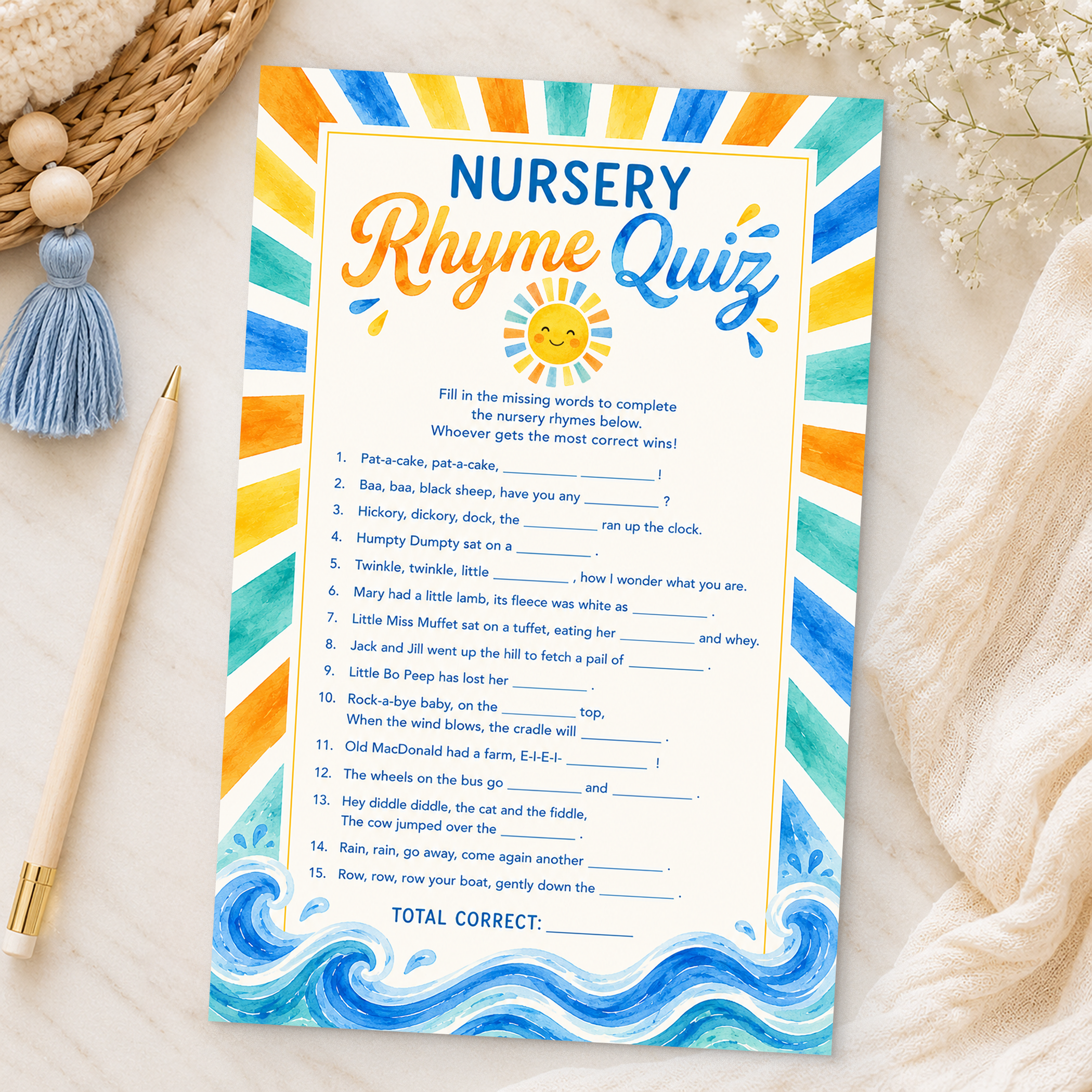 Nursery Rhyme Quiz baby shower game card styled with a pen, tassel, baby's breath flowers, and soft neutral linens in an editorial flat lay.