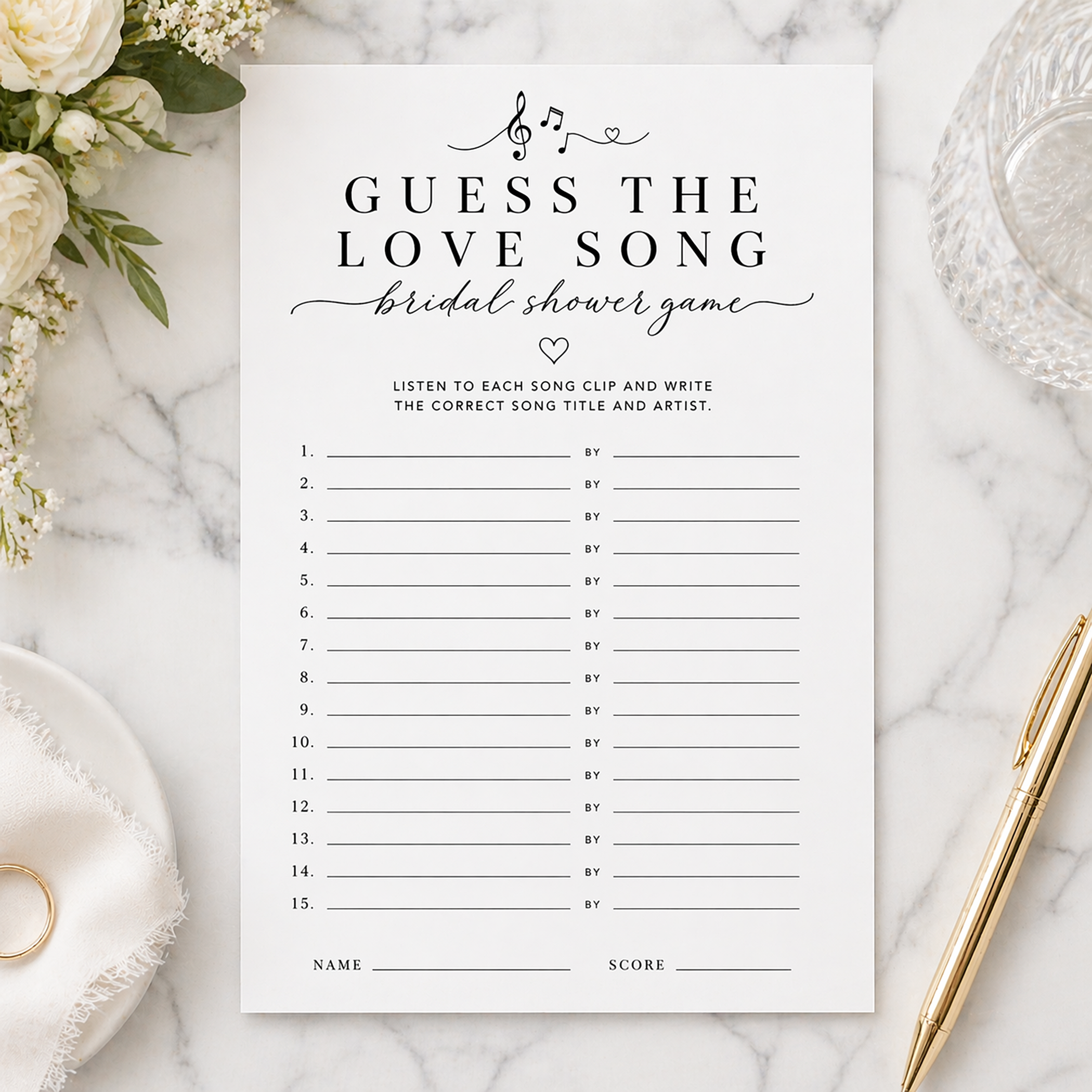 Elegant Guess the Love Song bridal shower game card styled on a white marble background with soft florals, gold pen, ring dish, and glass vase.