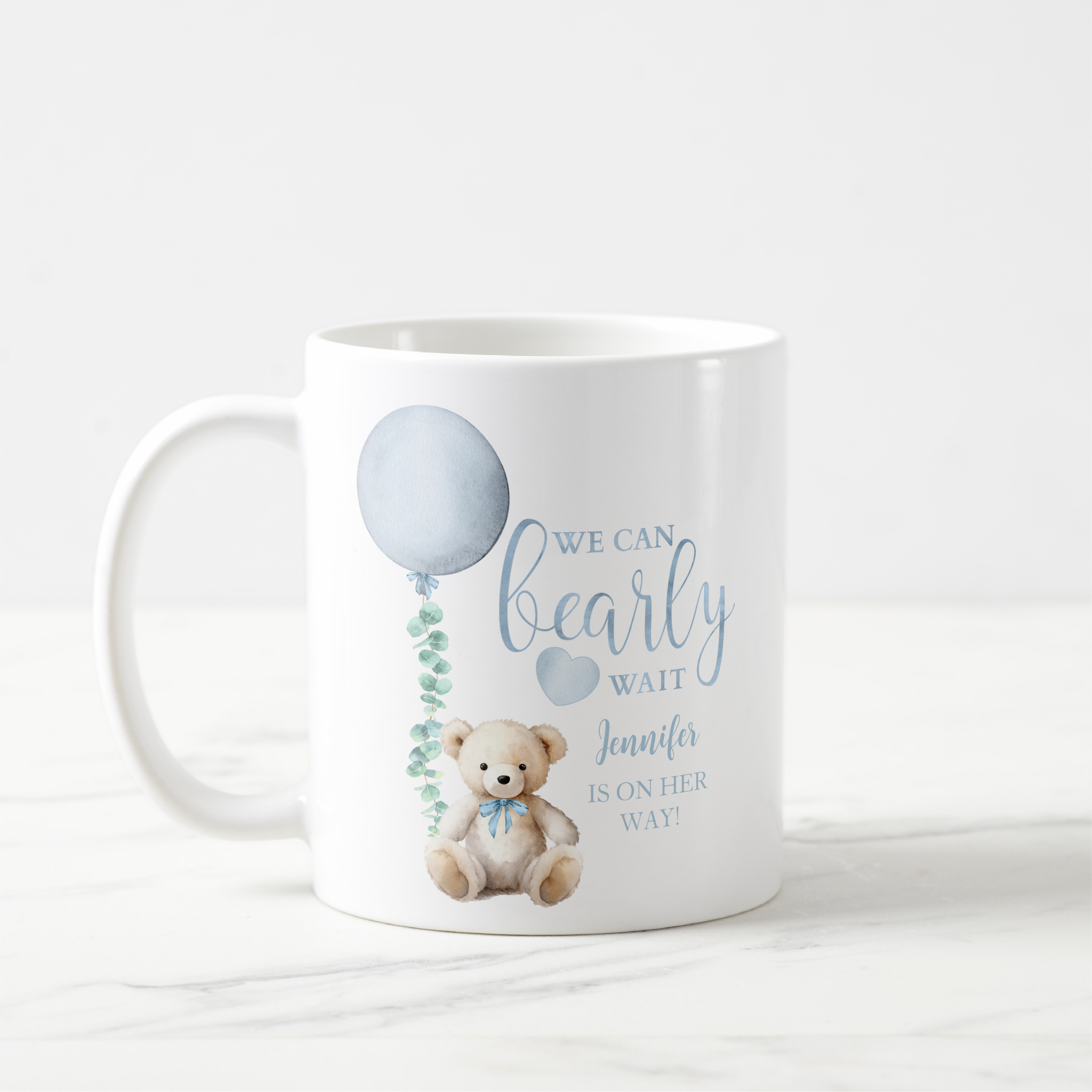 Personalized blue teddy bear baby shower mug with “We Can Bearly Wait” design.